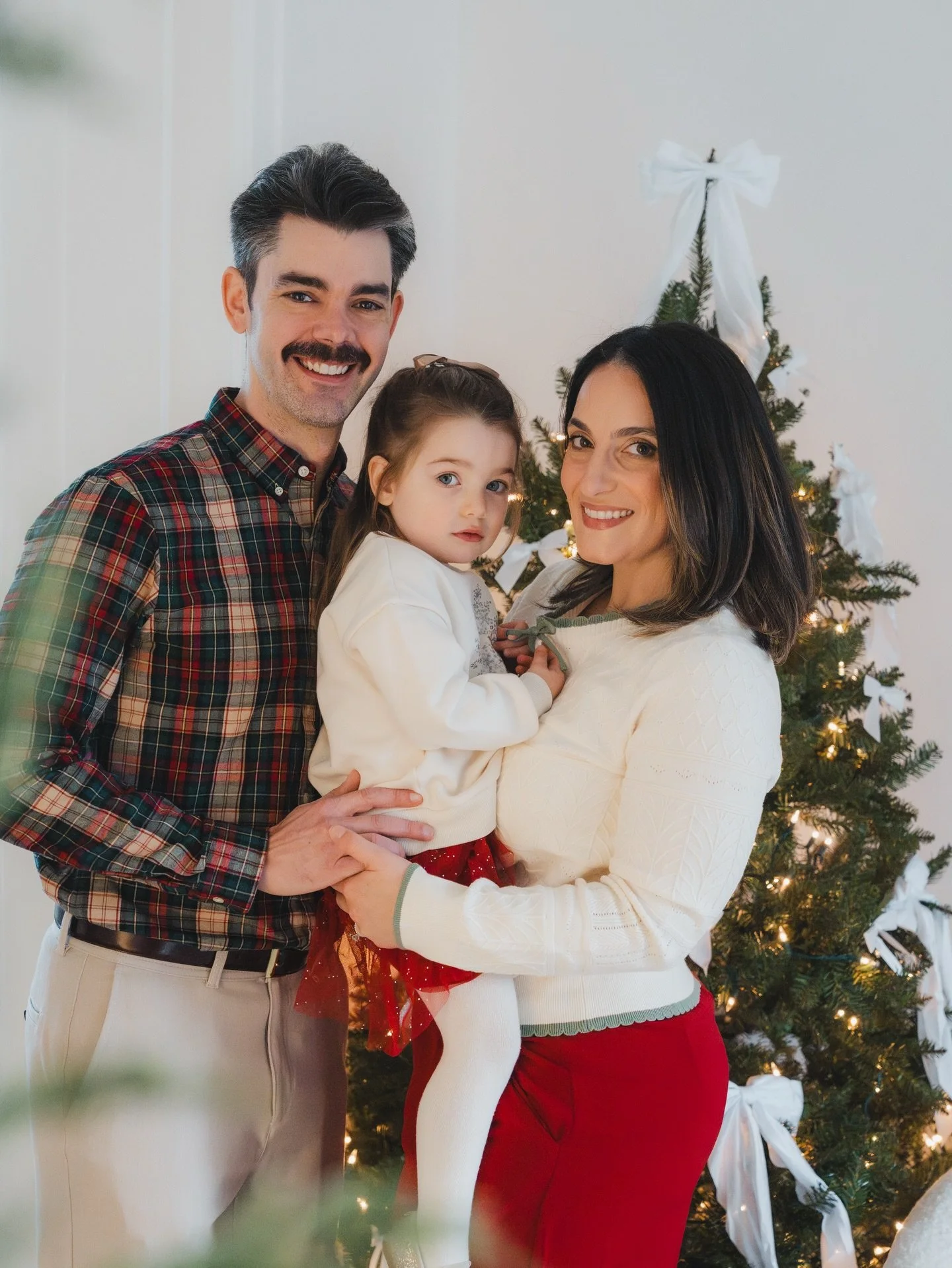 some favourites from one of our holiday minis with natasha + andrew (&amp; stella! the cutest model ever) &hearts;️

this season has been such a special one, and we loved welcoming your family into the studio to capture these moments together.

ps, t