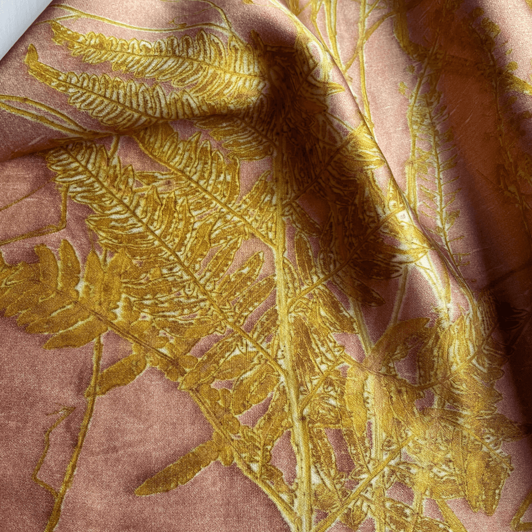 ecoprint combining multiple techniques creating a layered and expressive botanical composition