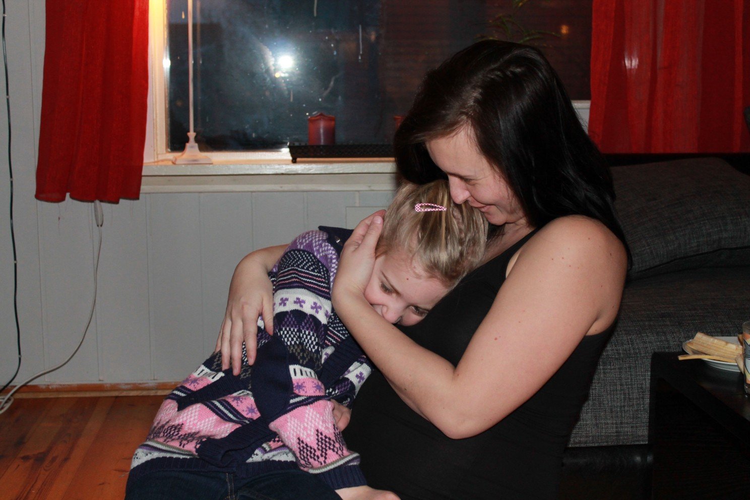 Mom and daughter hugging