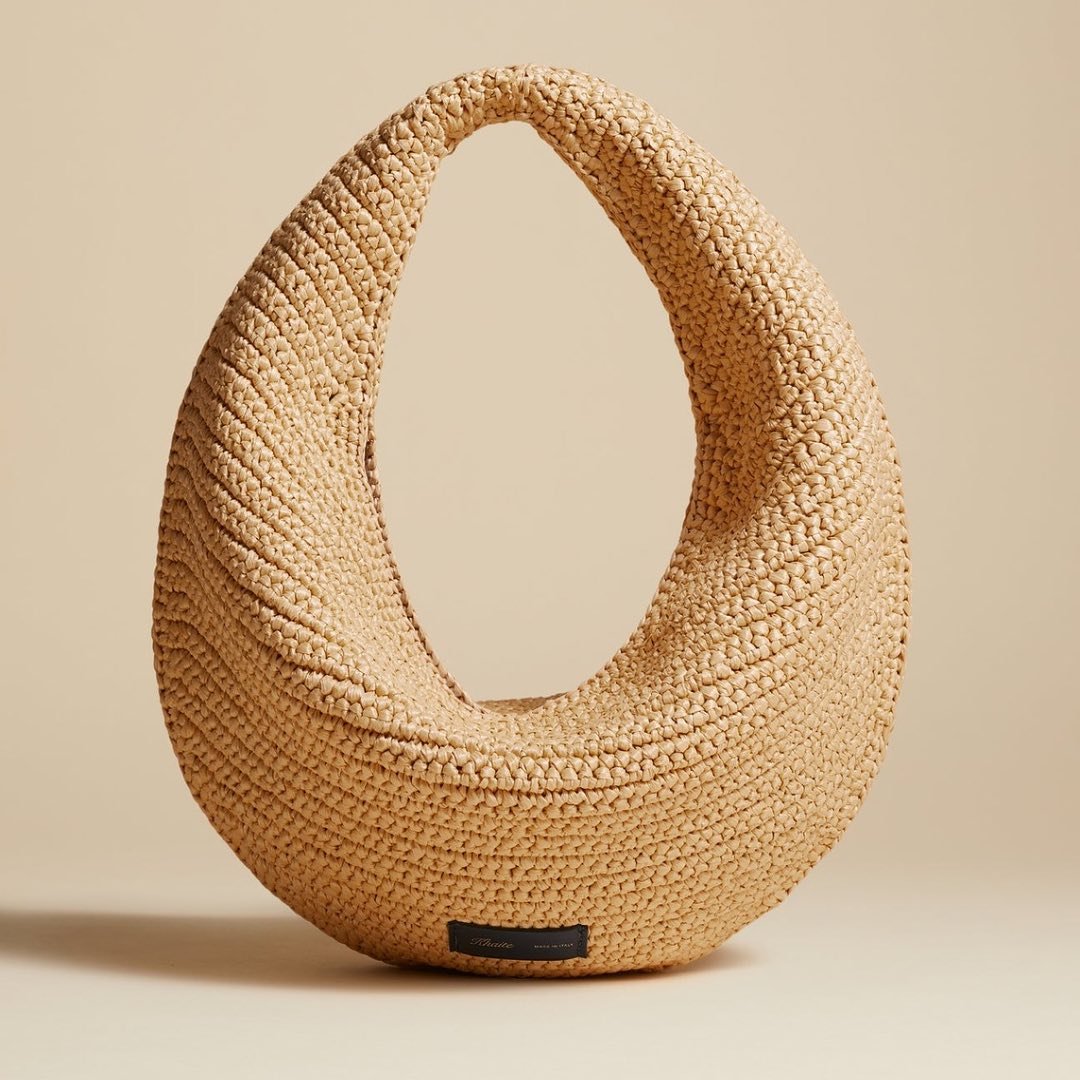 The perfect summer accessory: all eyes on the Khaite Raffia Bag, now delivered  in 50-minutes.