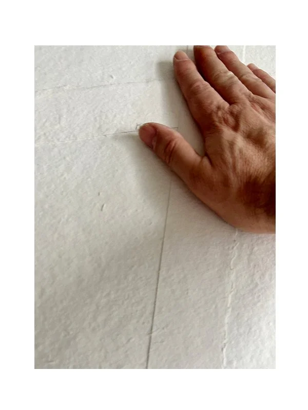 Sometimes I build from scrap.
I cut, rip, shred any acid-free paper, then layer it in varying shapes, patterns, and directions, guided by the image I plan to print. Acid-free glue holds the sheet together, and I carefully manage its thickness and wei