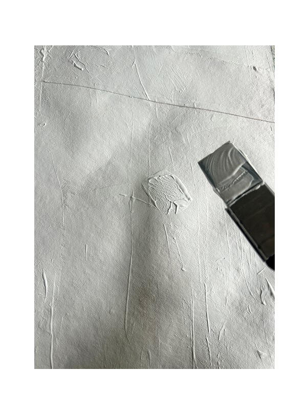 Once dry and flat, Gesso is layered over the sheet. It pro-tects, stabilises, and introduces texture. Application can be with brushes or any object that leaves or not a mark.