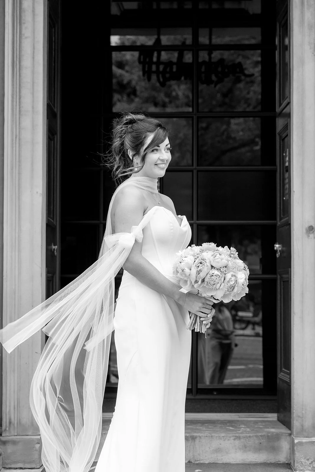 Bride holding flowers on her wedding morning for a luxury wedding in Scotland.