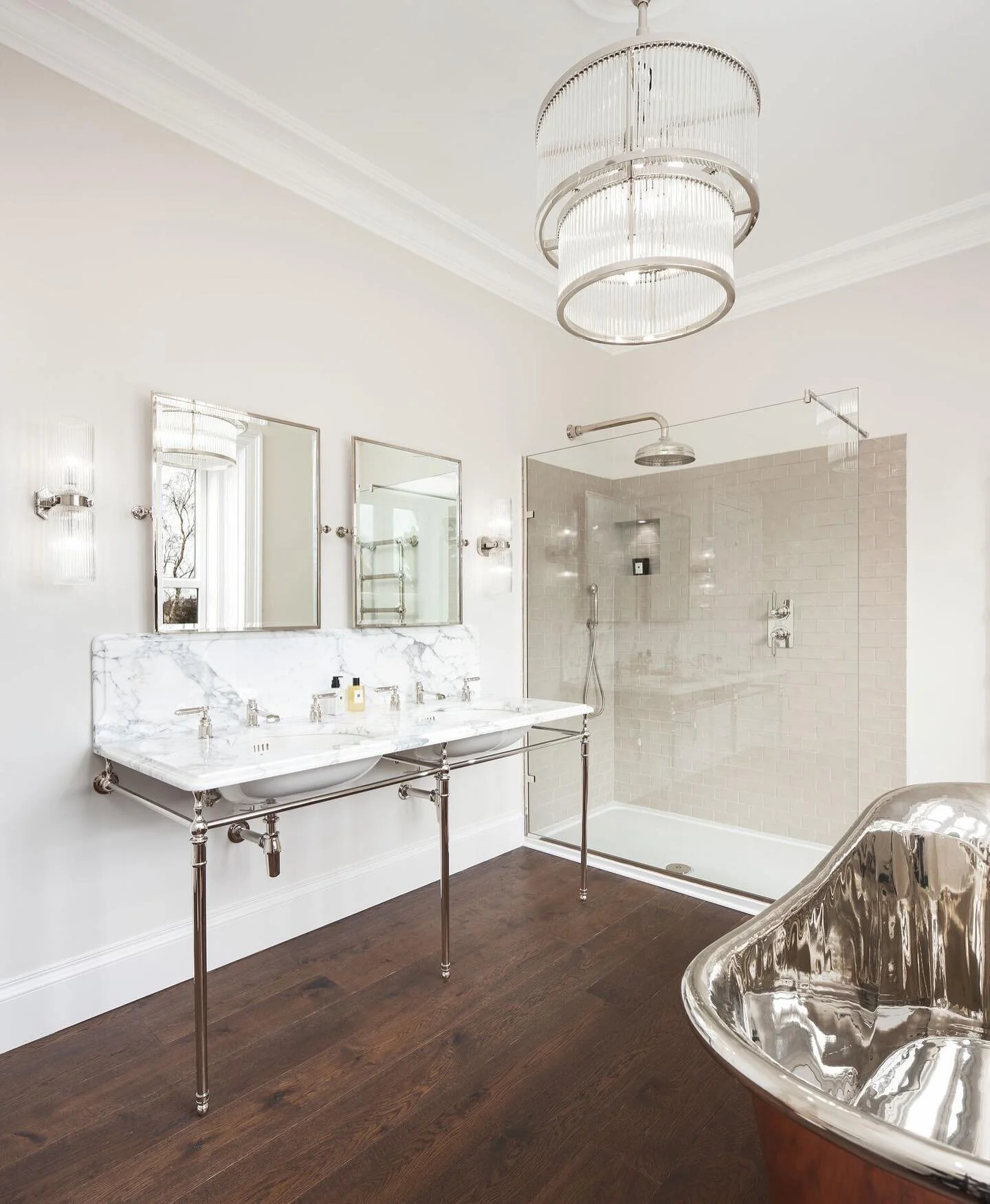 &bull; Neutral Statements ✨

We opted for a clean, classic design within this bathroom space, which was formed of muted colours. The subtle polished nickel brassware and arabescato marble from the Double Lowther basin suite contrasts the darker tones