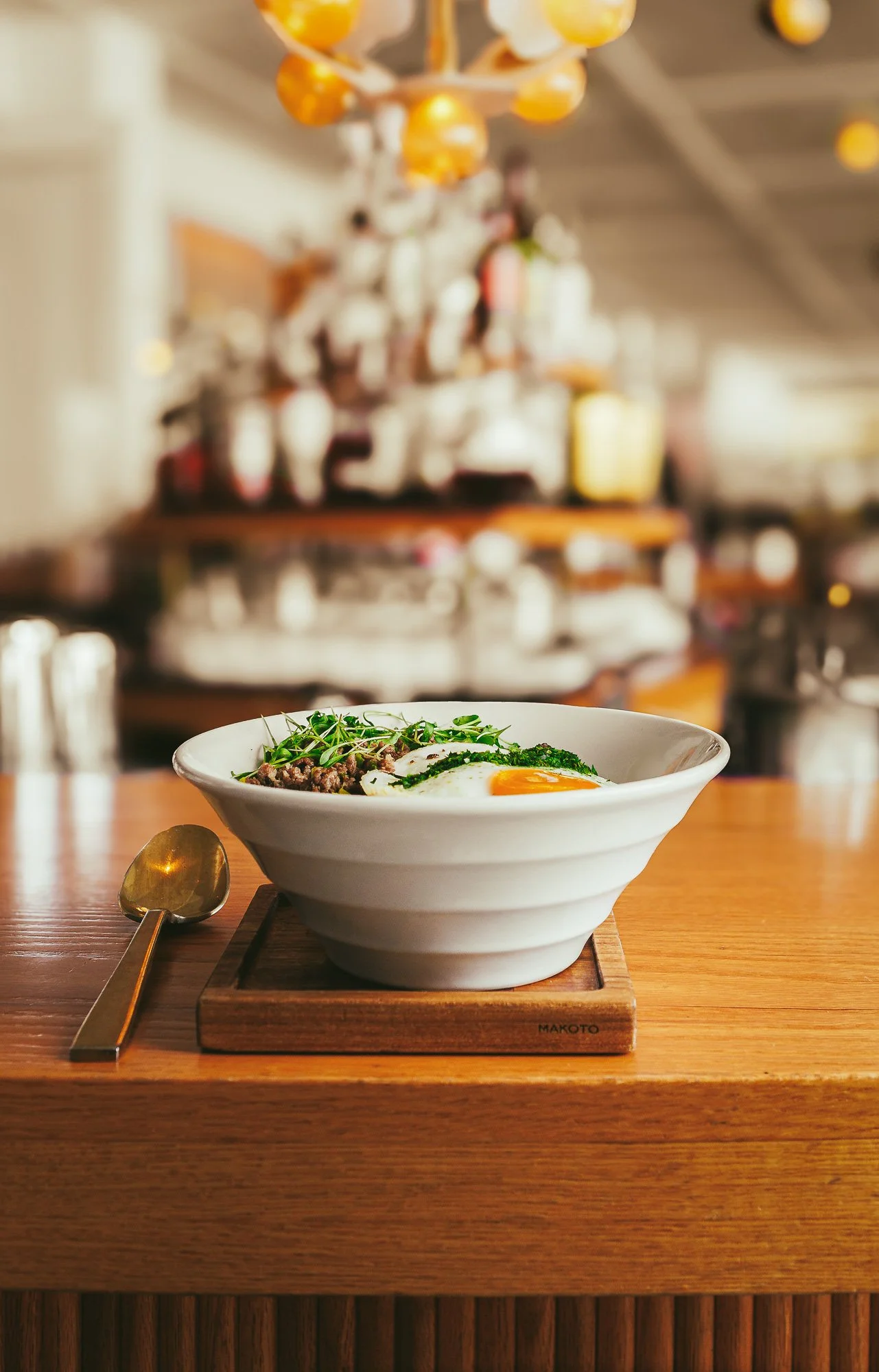 Fine dining Japanese food photography at Makoto Miami featuring an elegant plated dish