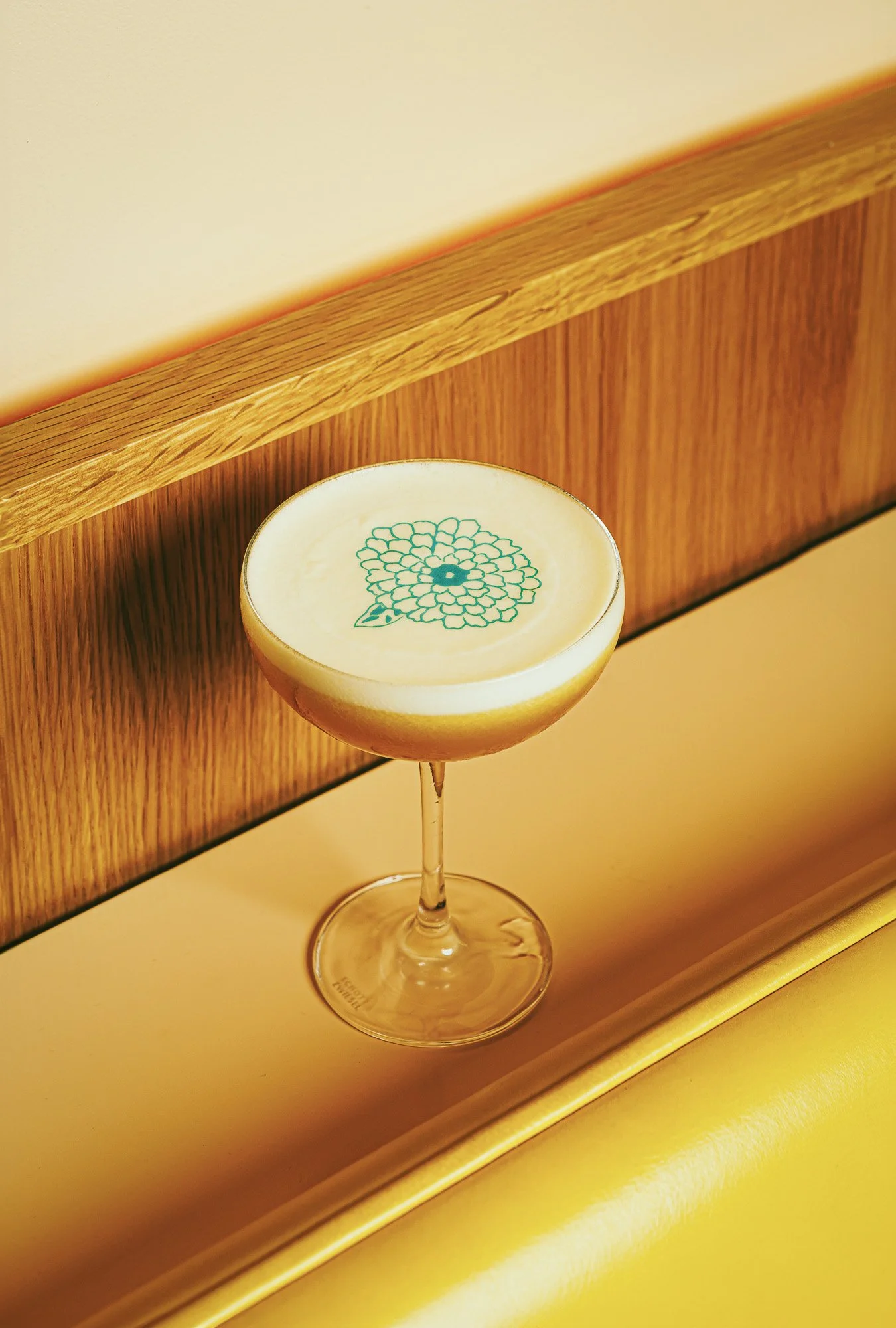 Cocktail photography at Makoto Miami featuring a signature drink in a fine dining Japanese restaurant.