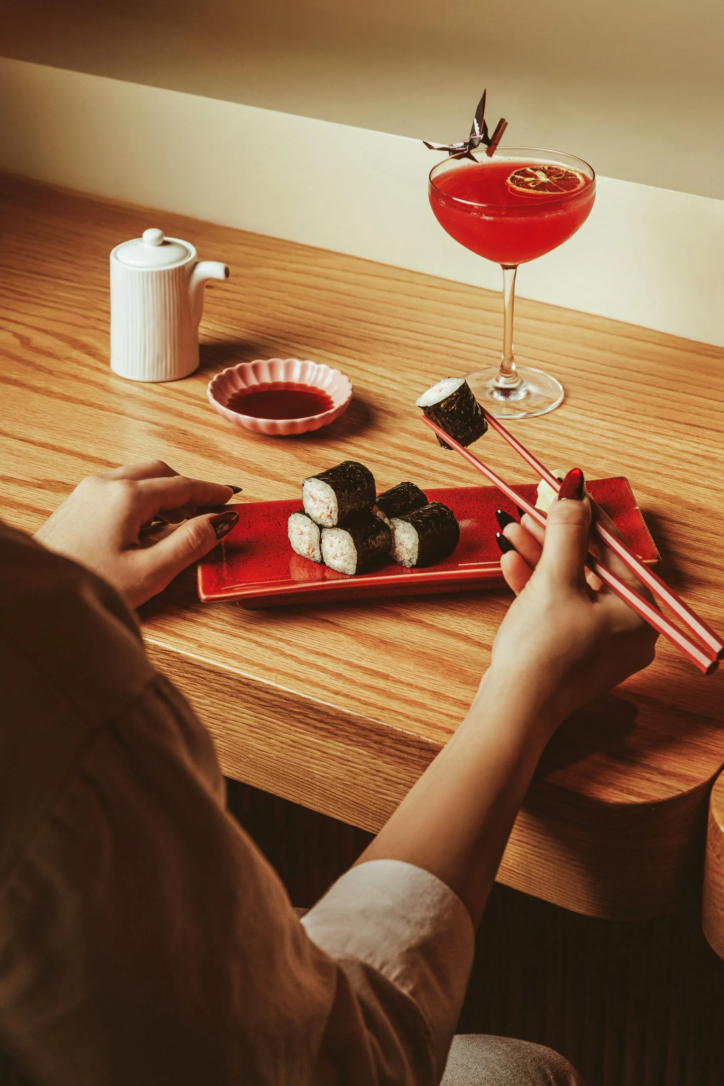 Restaurant dining experience photography at Makoto Miami featuring sushi and a cocktail pairing