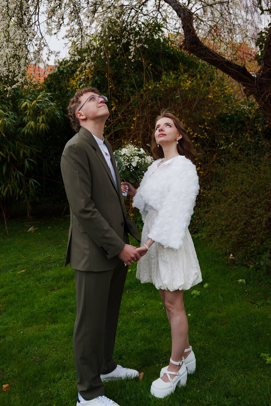 Relaxed wedding portrait in small garden in Ærøskøbing after a City Hall ceremony.