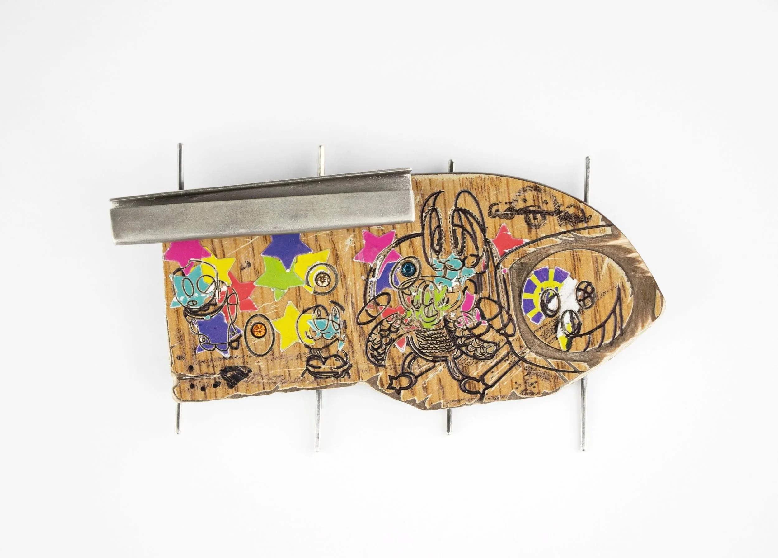 Title: Ability Materials: Stones, steel, school desk, sterling silver, stickers, sharpie Size: 2.5 x 3.5 x 1.25 Year: 2018