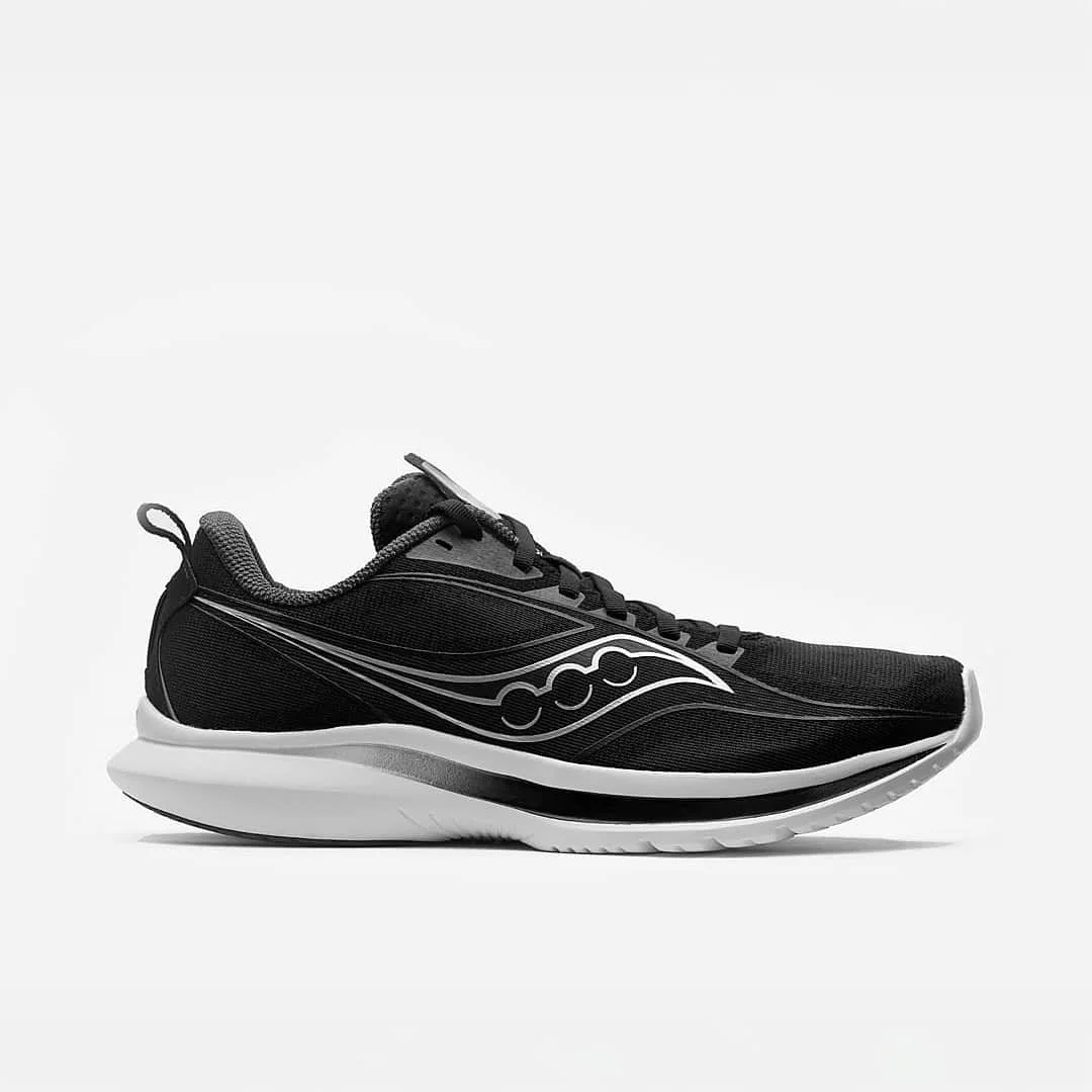 Saucony black running shoe e-commerce product photography white background