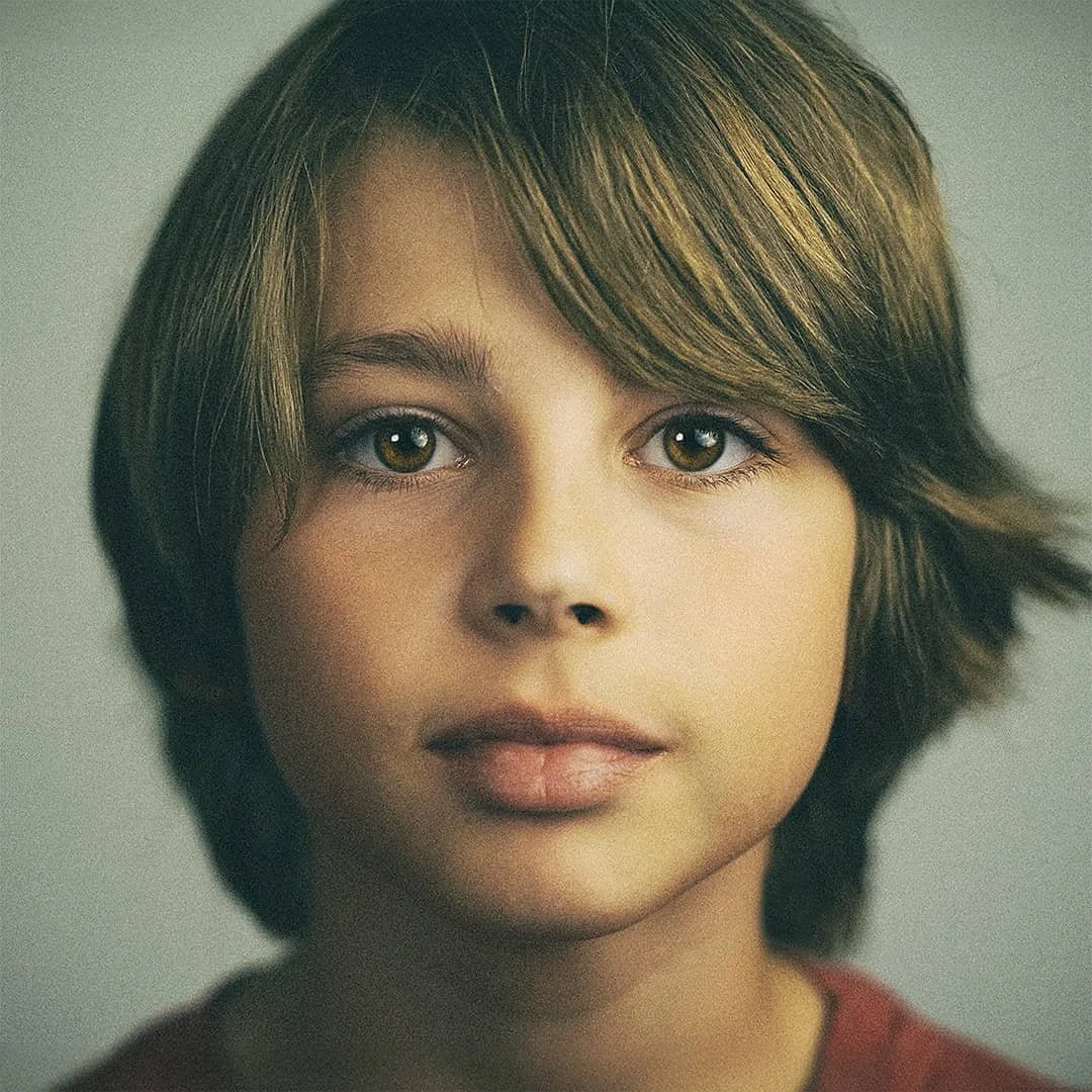 commercial studio portrait of young boy with natural studio lighting