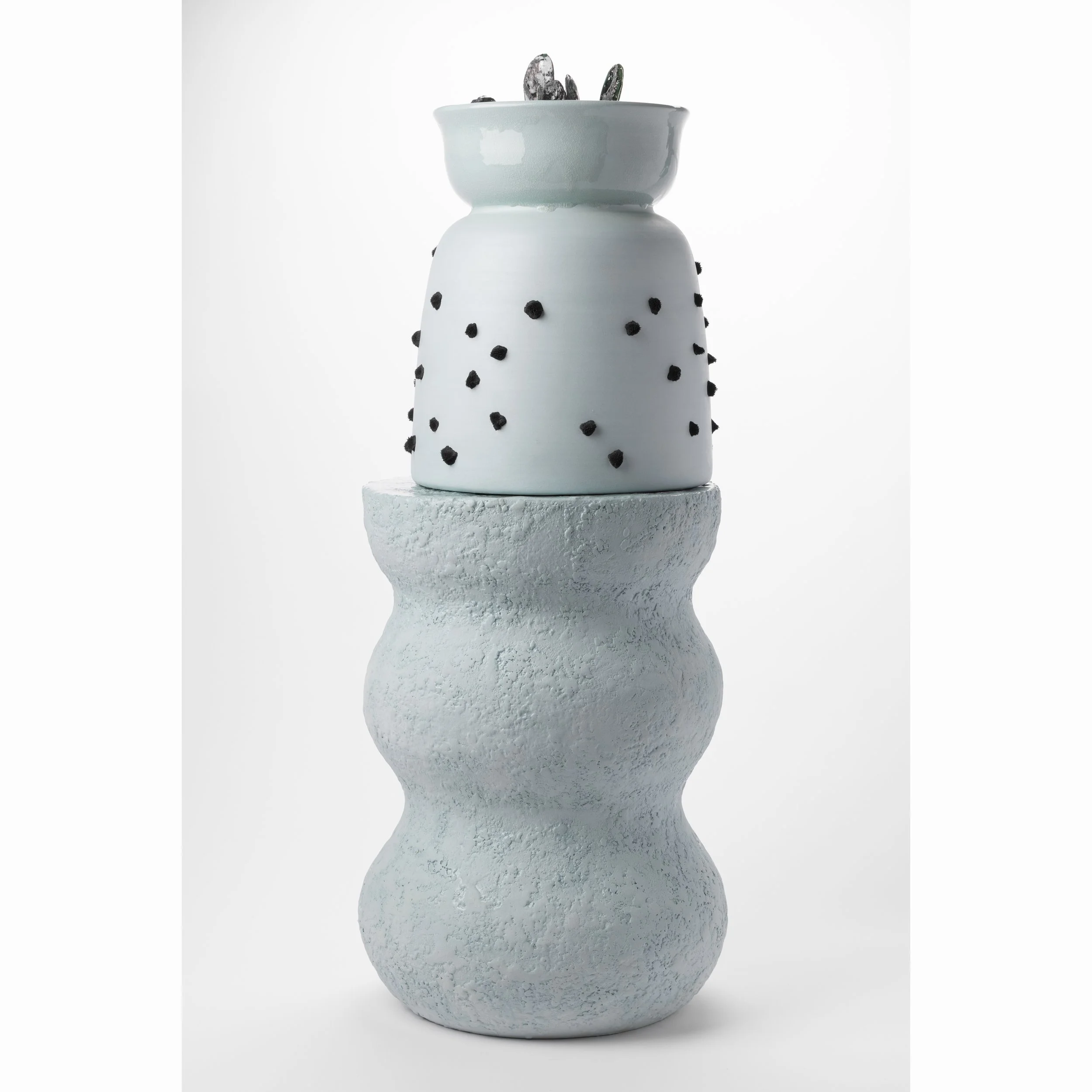 Vase magnétique sur bitume