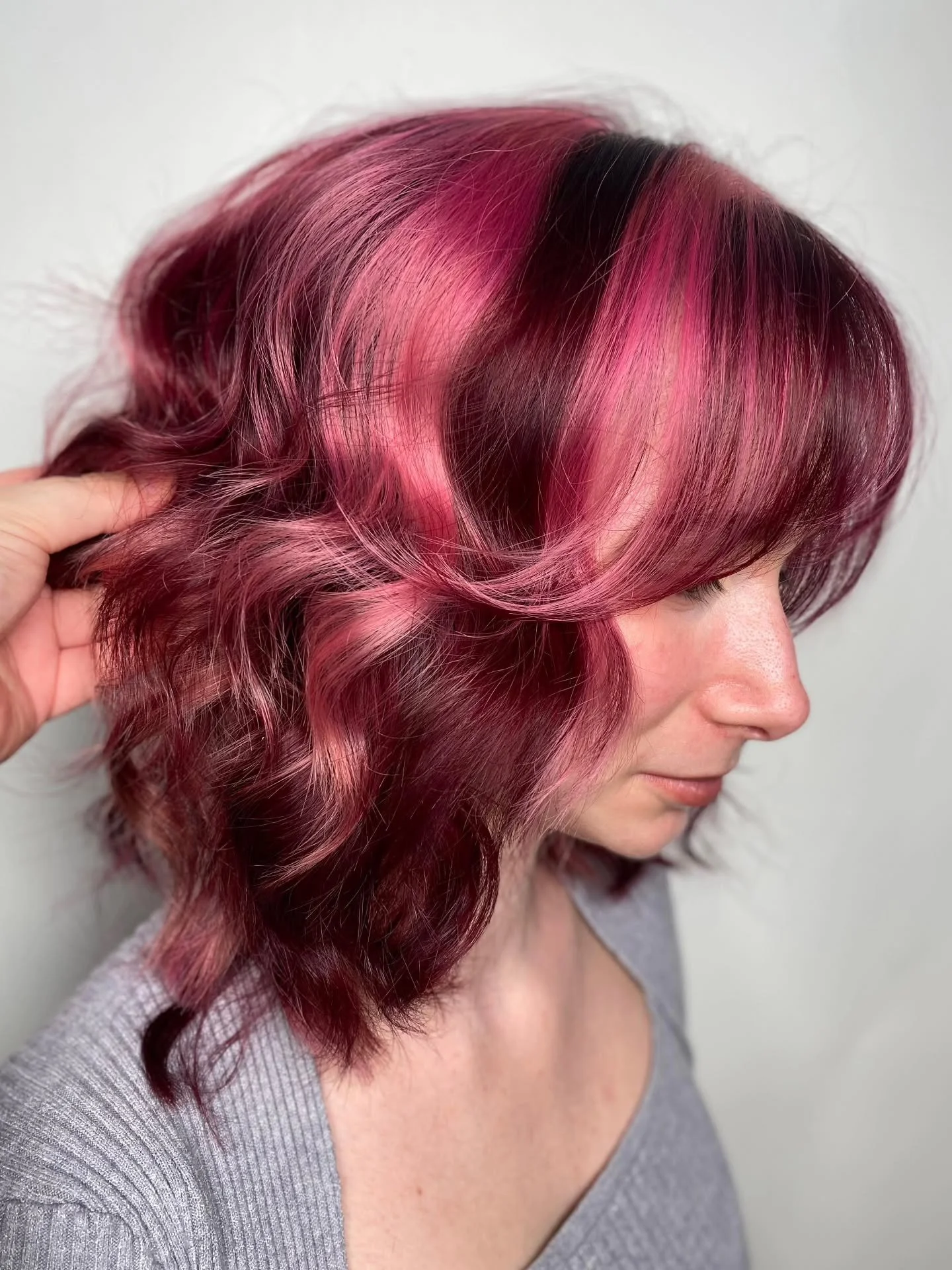 💜💕 Y2K Glow Refresh 💕💜⁠
Lilly came back to our Hairspace to revive her iconic Y2K moment &mdash; and we were SO ready for round two! ✨🦋⁠

This time, we refreshed her bold pink + purple highlights, keeping that chunky early-2000s vibe while makin