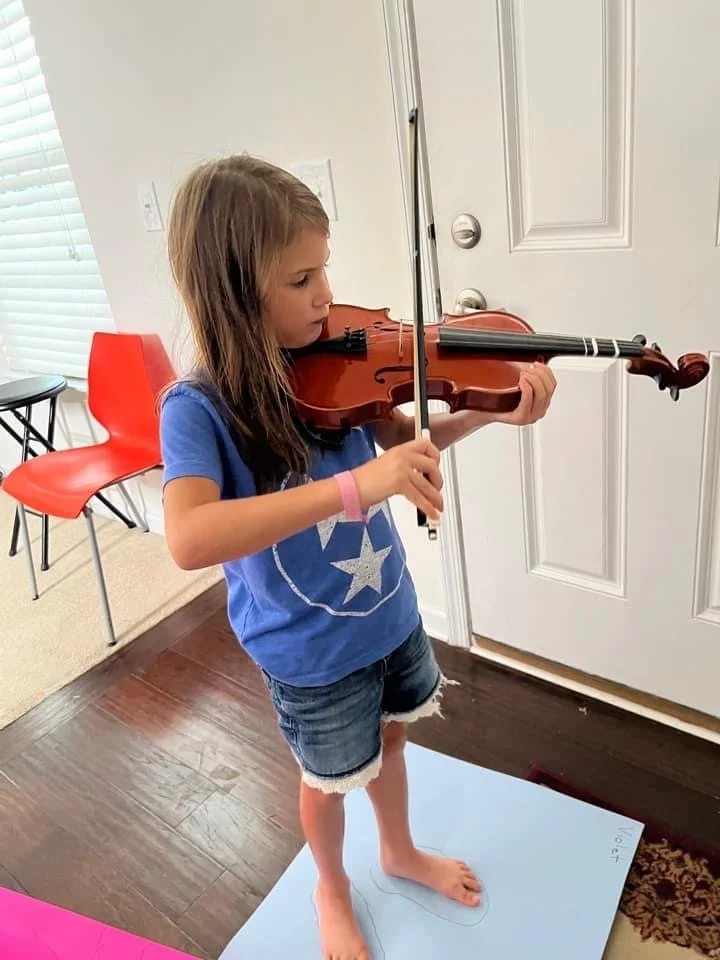 Violin student of Elaine Winters