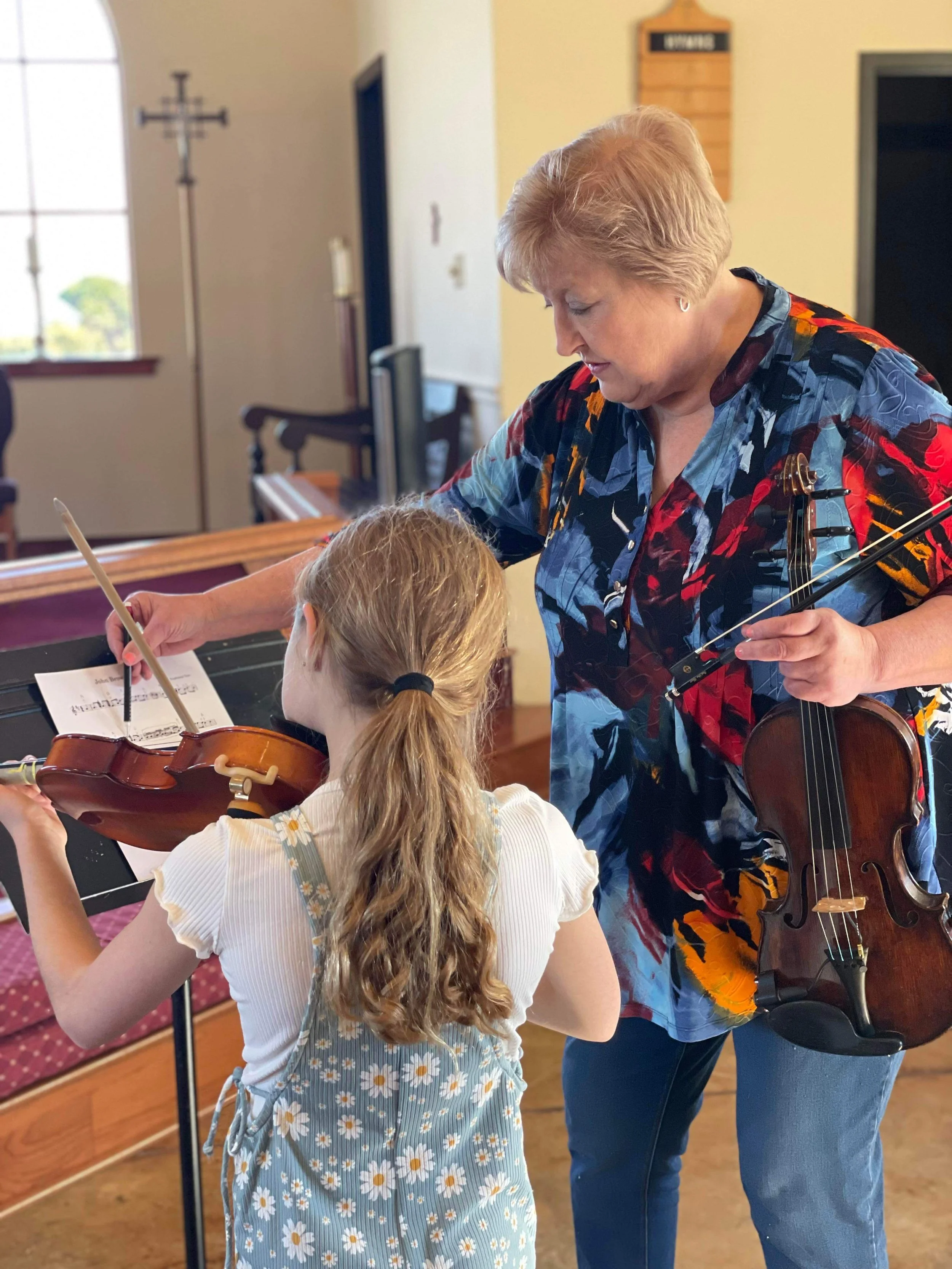 Elaine teaching one of her students