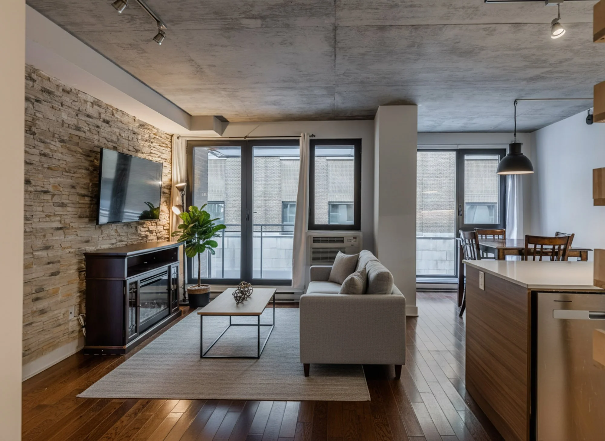 Firefly_Gemini Flash_Virtually stage this condo living room in a modern industrial style. Add a medium-siz 249304-10.jpg