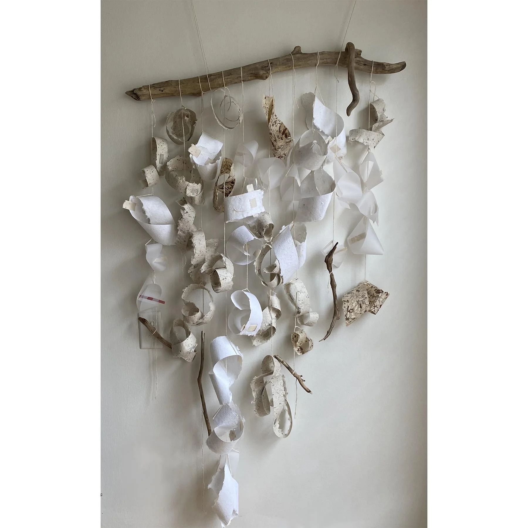 River, Handmade paper (Tuesday Night Studio), river sticks, cotton string, branch, 60’ x 30’, 2024
