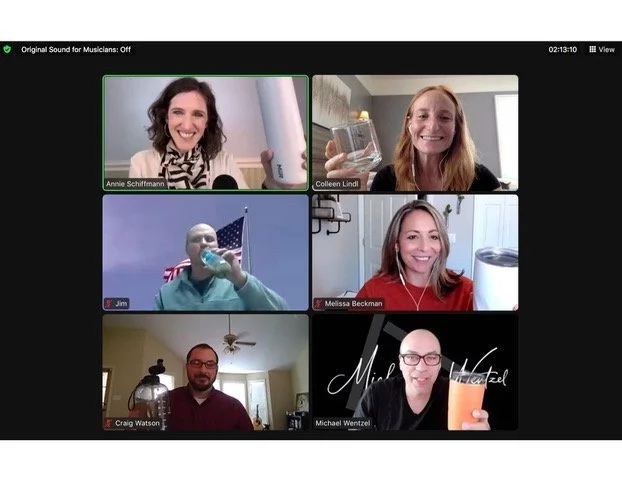 Virtual accountability group meeting with multiple small business owners on a video call, representing peer check-ins and consistent follow-through.
