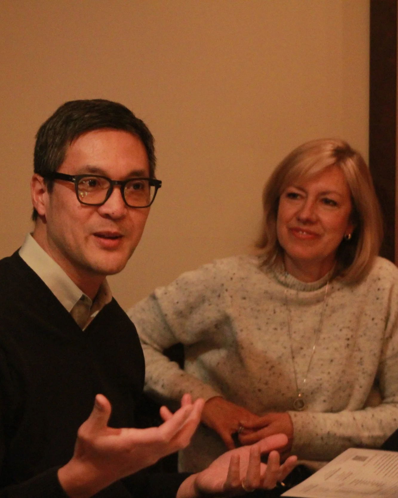 Dave Bernadino speaking with Lisa Barfield during a Marketing Algonquin dinner discussion on content and trust