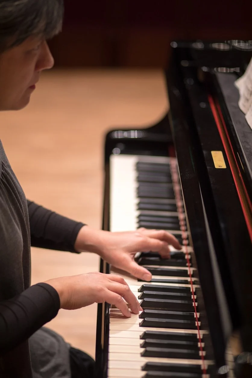 A person playing the piano.