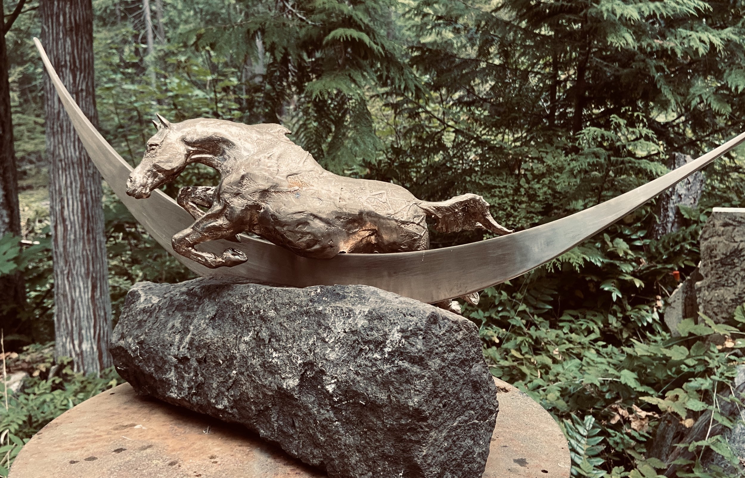 20. BRII JUMPS OVER THE MOON , Sara Mall Johani Cast bronze. 35X15X17 Photo shows unfinished piece.