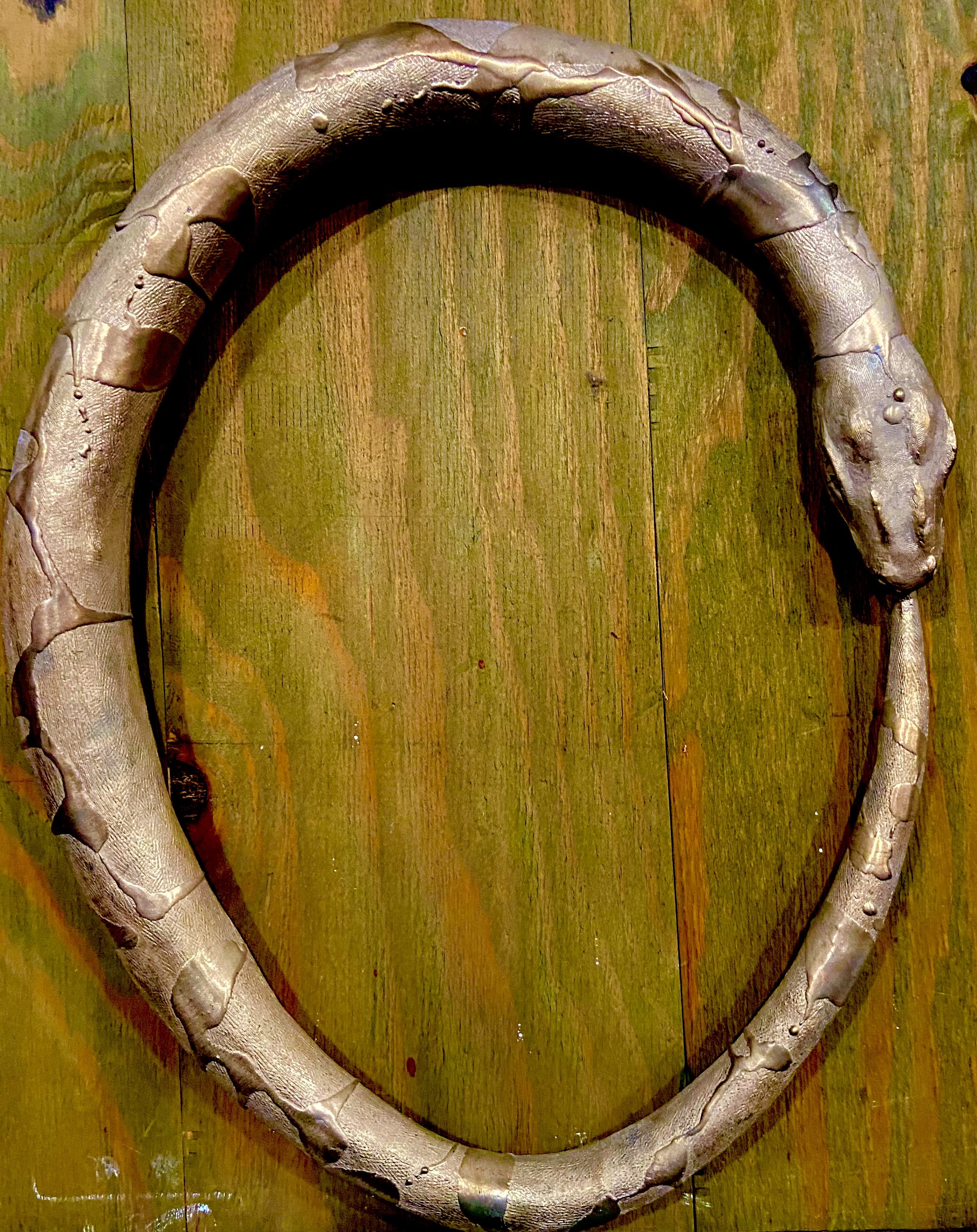 20. OROBOUROS , Sara Mall Johani Cast bronze. 18X15X3 Photo shows unfinished piece.