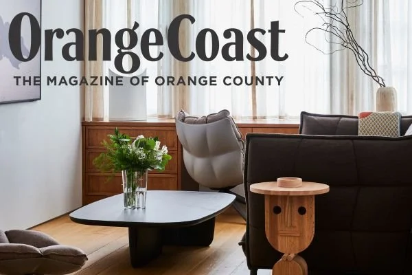 Orange Coast Magazine with living room in background