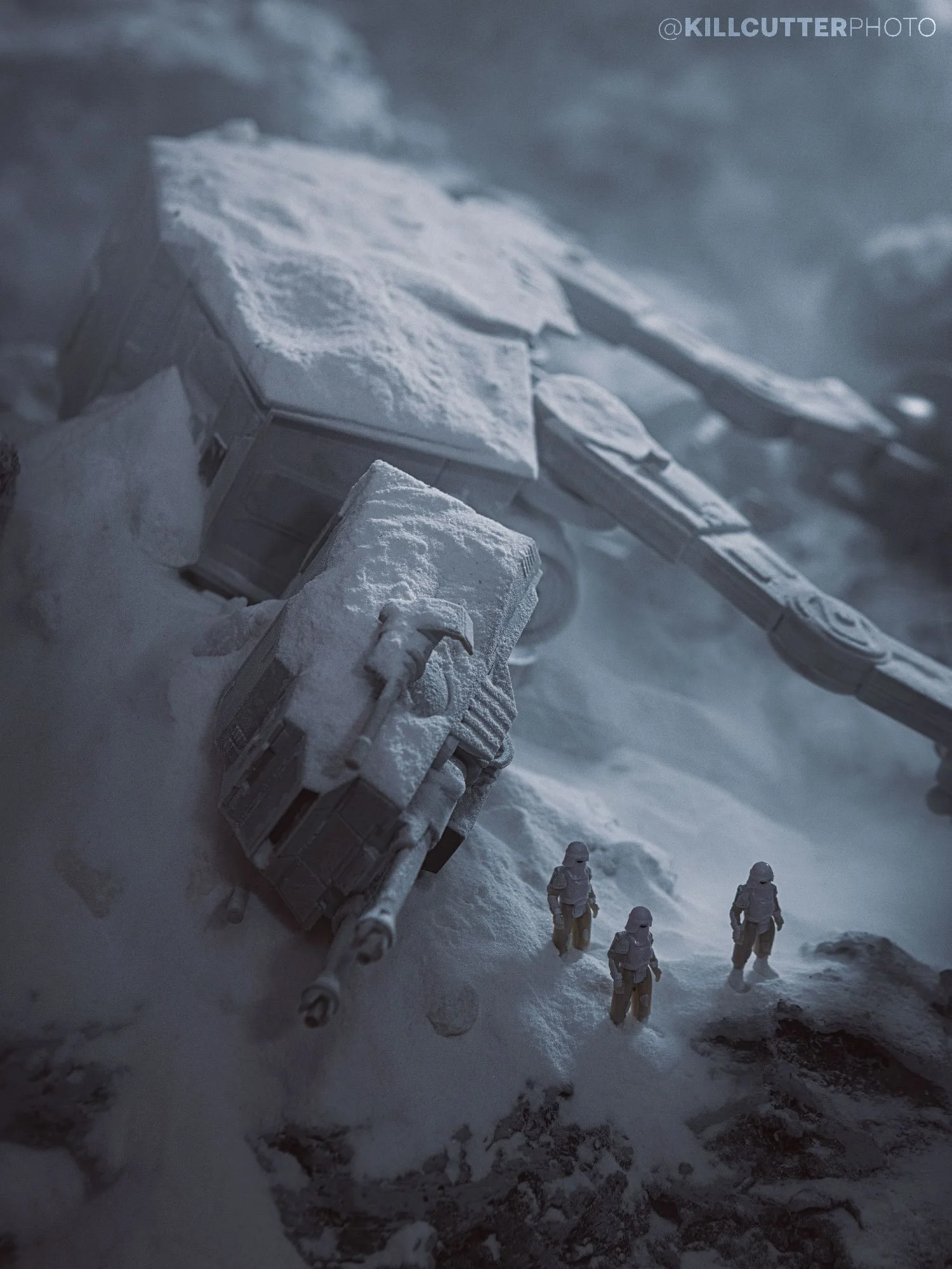 Turns out all-terrain has its limits.

&ldquo;The Empire Strikes Ice&rdquo; 
Using my modular, snow-capped mountain terrain pieces, I positioned the AT-AT on its side and packed plenty of baking soda around it to make the walker feel heavy and partia