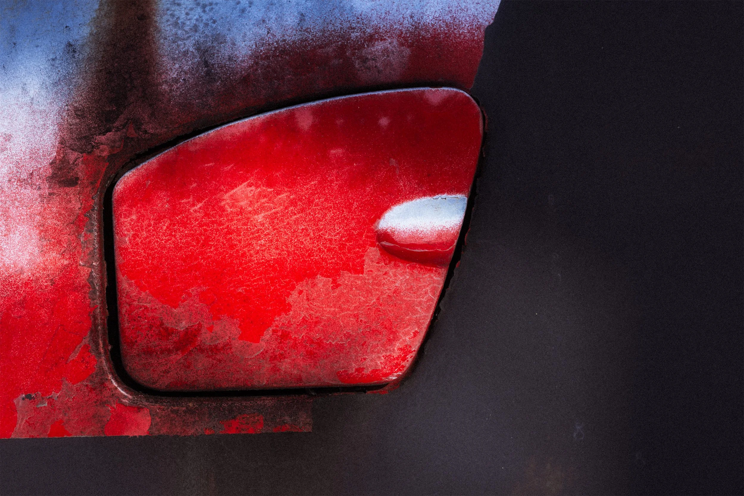 Gas cap door from a 1957 Plymouth Fury