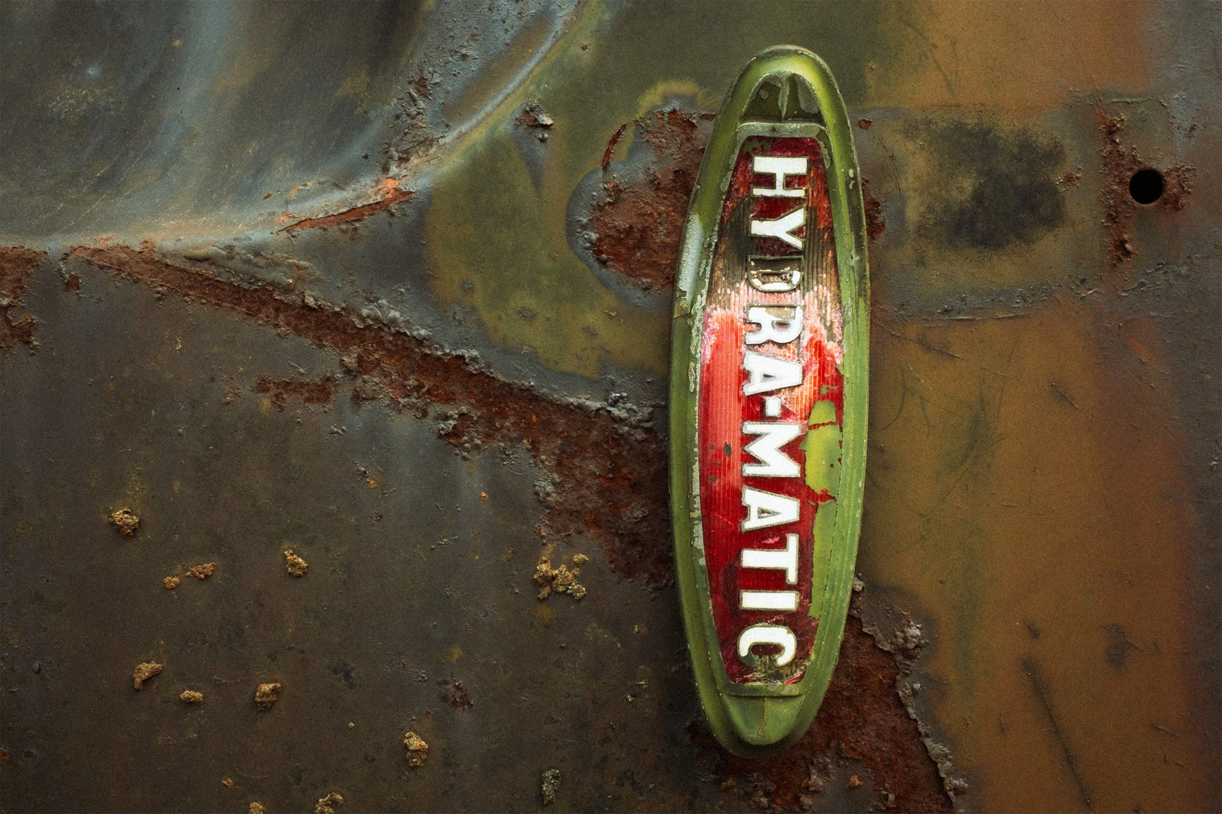 Image of a Oldsmobile Hydramatic emblem from the 1950's