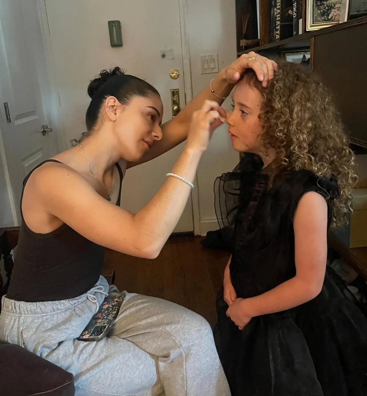 The Strange Child (Indie Griffiths) gets a touch-up from DP Charlotte Keir.