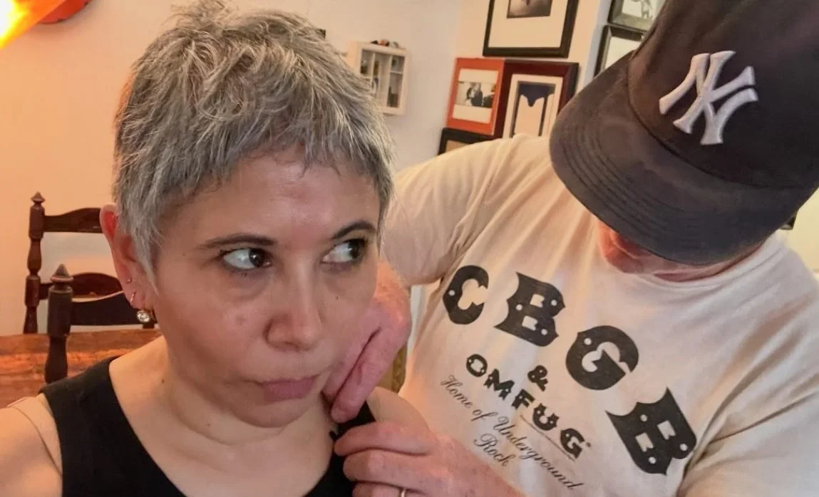 Xena (Gina Jarrin) gets mic'ed up by director Andy Keir.