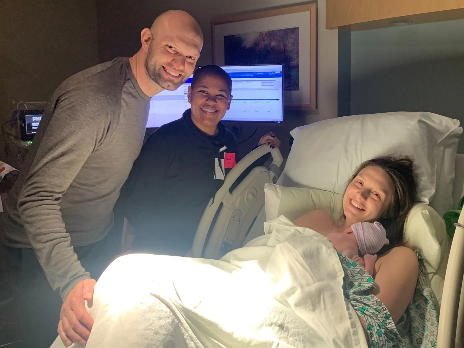 Kelli Blinn doula posing with labor doula client after giving birth in Bexley Ohio