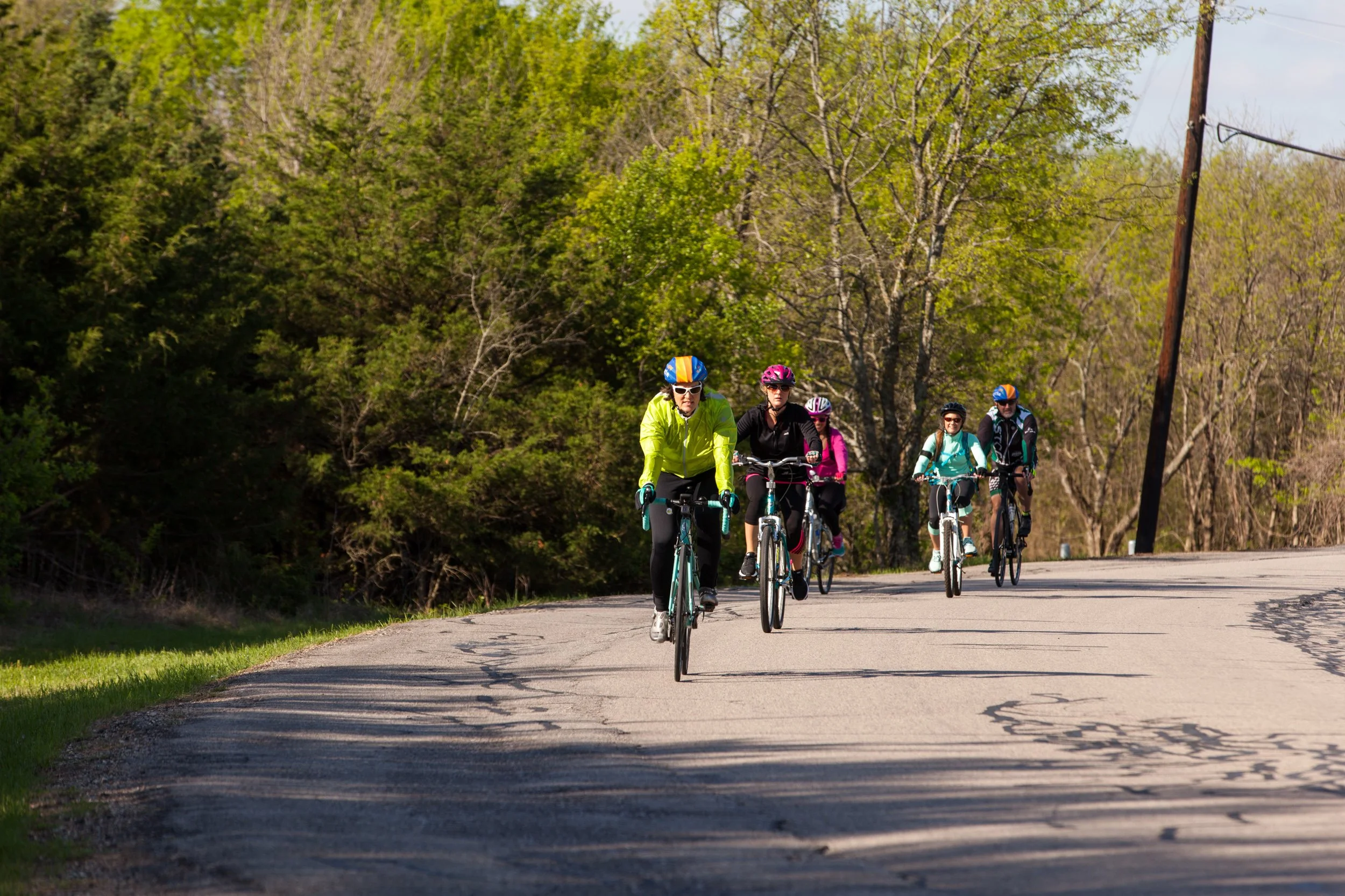 Riders travel along the course during a National Psoriasis Foundation cycling fundraiser, photographed as part of on-route event coverage.