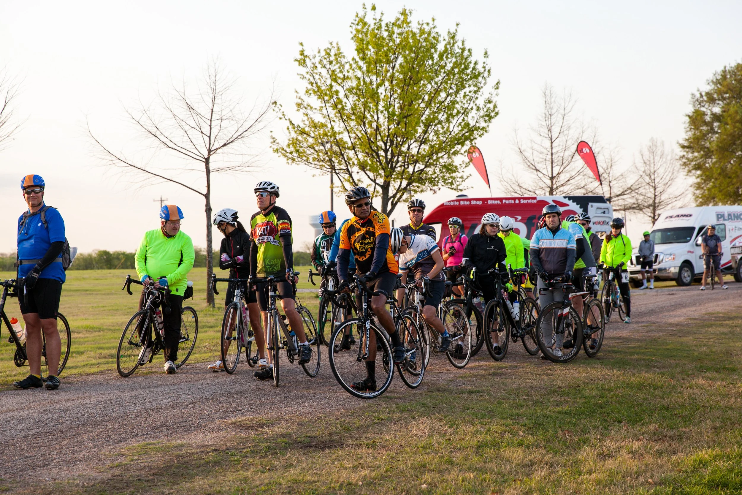 Cyclists gather with their bikes before the start of a nonprofit fundraising ride benefiting the National Psoriasis Foundation.