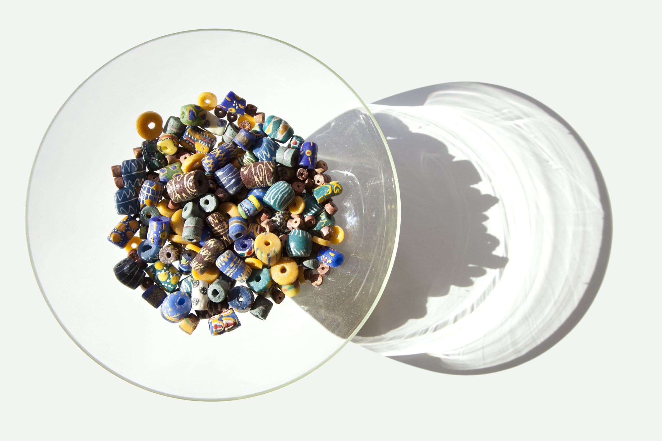 glass-bowl-of-beads-on-white-tabletop_8126600023_o.jpg