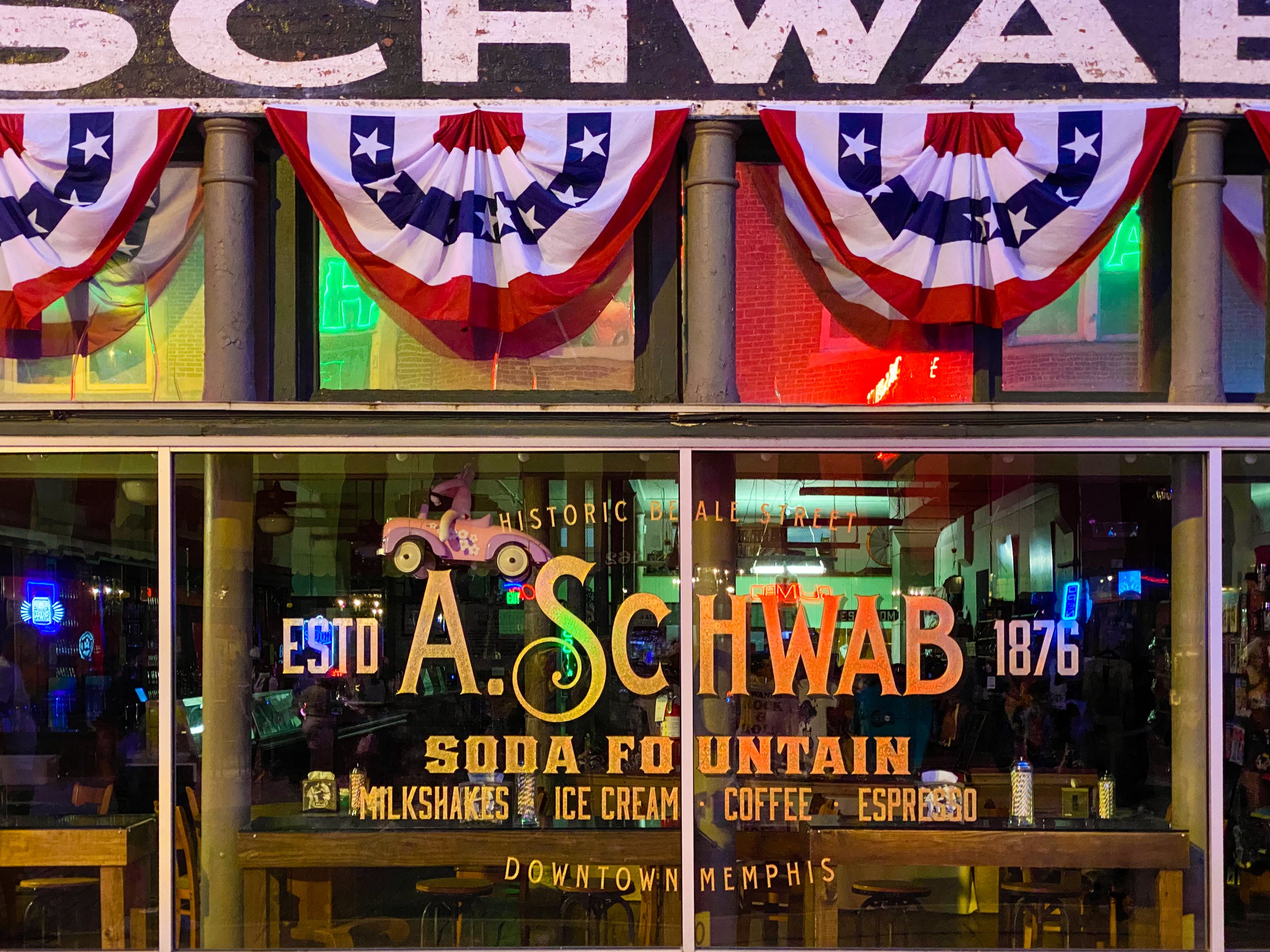 a-schwab-storefront-at-night_52094472735_o.jpg