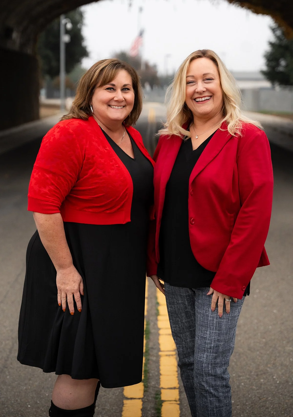 Laurie’s customers, Fernando and Kate embracing by the lake on their wedding day.