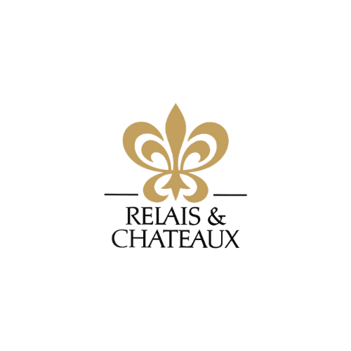 A gold fleur-de-lis symbol above the words 'RELAIS & CHATEAUX' on a black background.