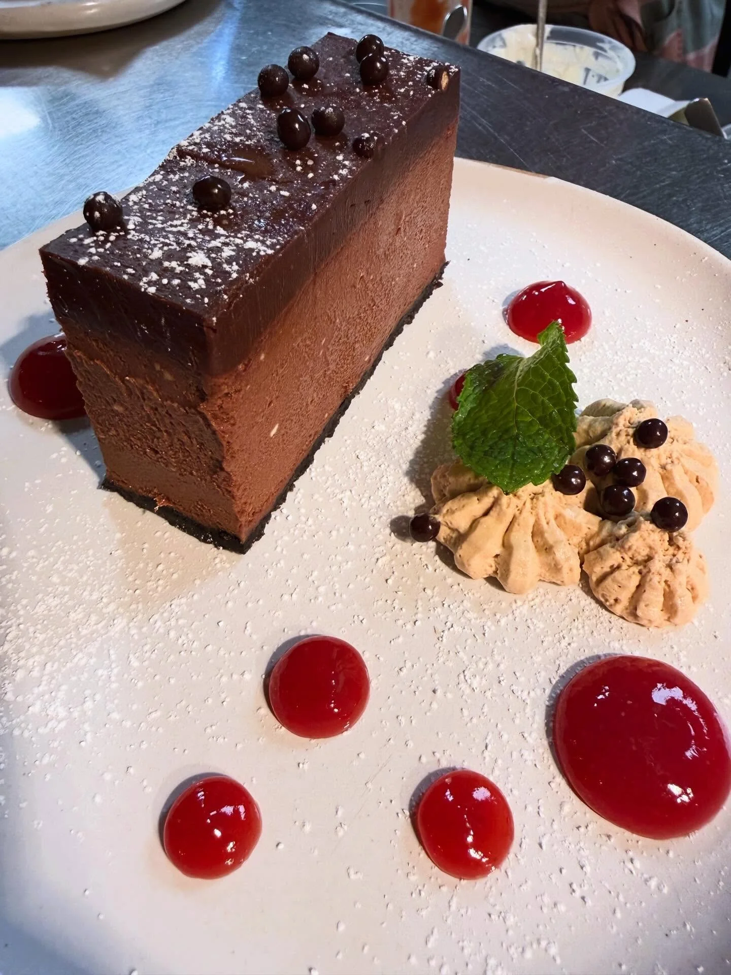 🍓New on the dessert menu from Chef Pat&hellip;.
Chocolate Cheesecake Bar with Oreo crust, raspberry sauce and coffee whipped cream. Definitely time to save room.
