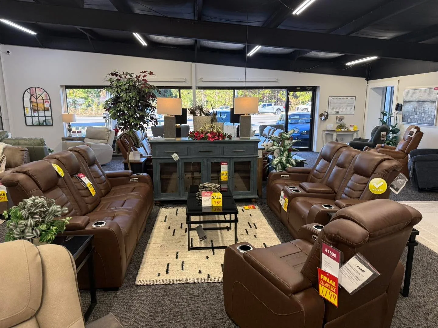 This power sofa and loveseat have  a luxe look and fabulous feel with hidden compartments in the armrest. The power touch buttons make reclining a breeze to set to your favorite position. These are in stock and on sale. Limited quantities. Was $2559 