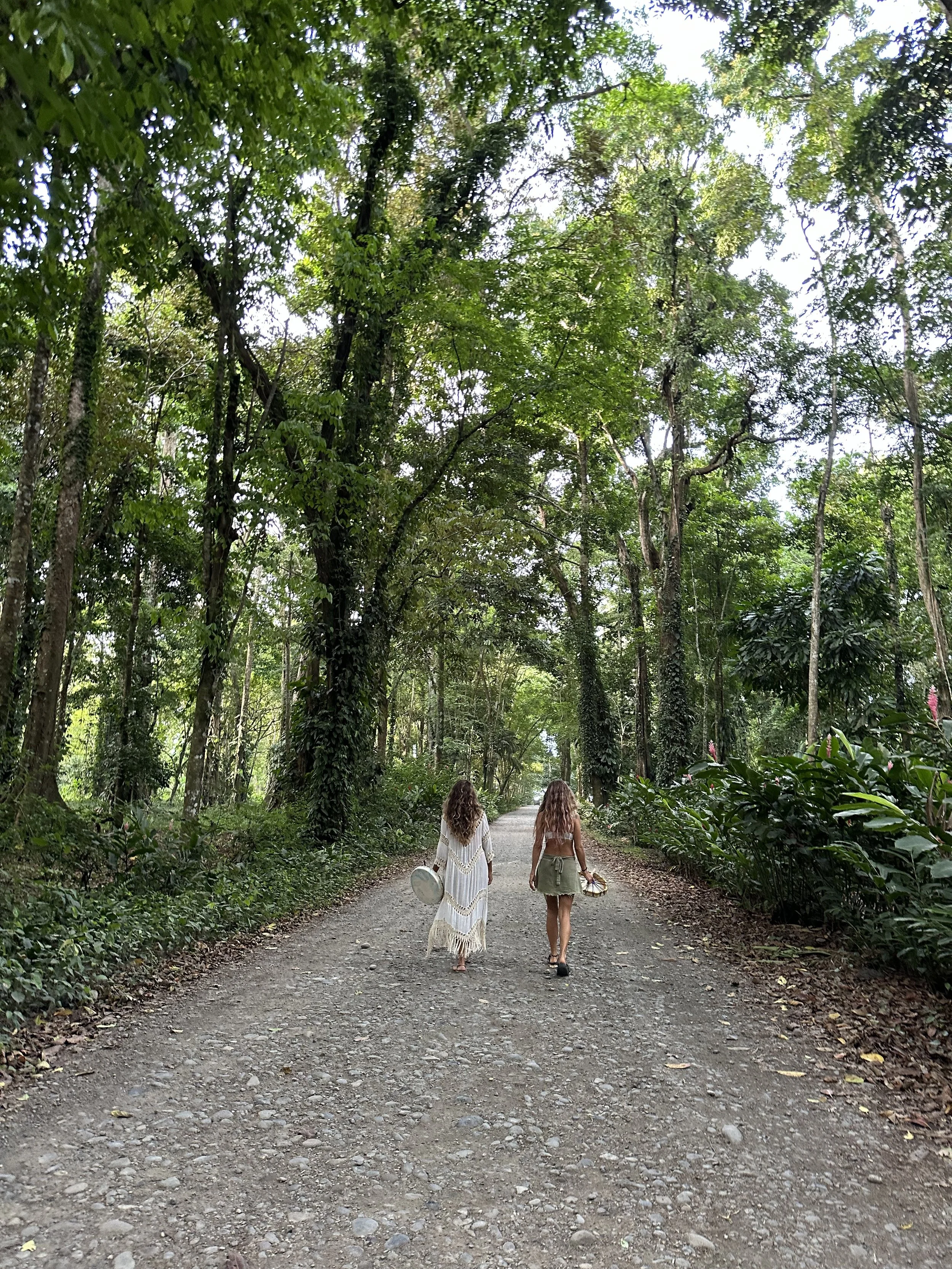 Tara and Kayla walk to Beach.jpeg