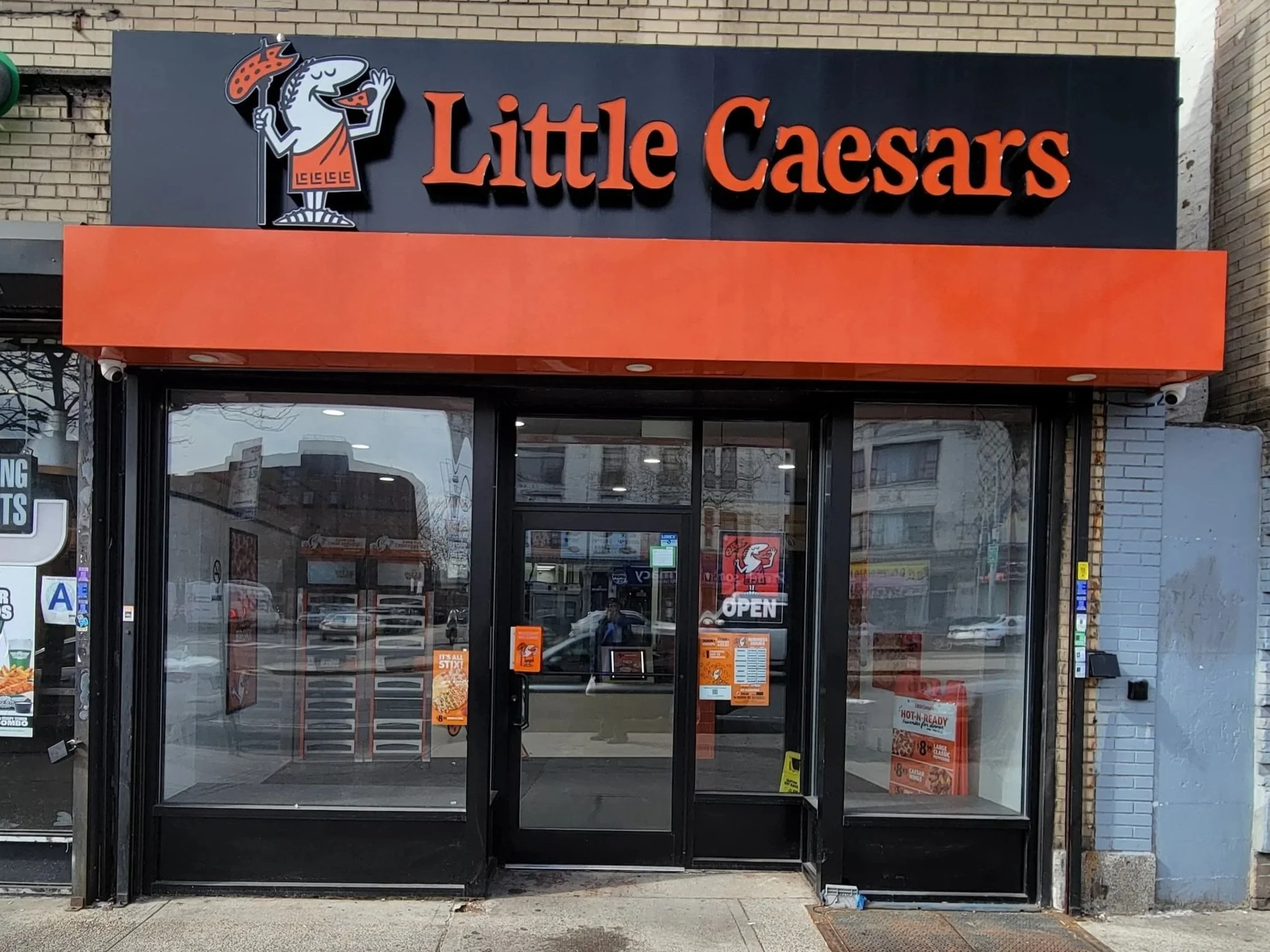 Image of Little Caesars store front in the Bronx, New York