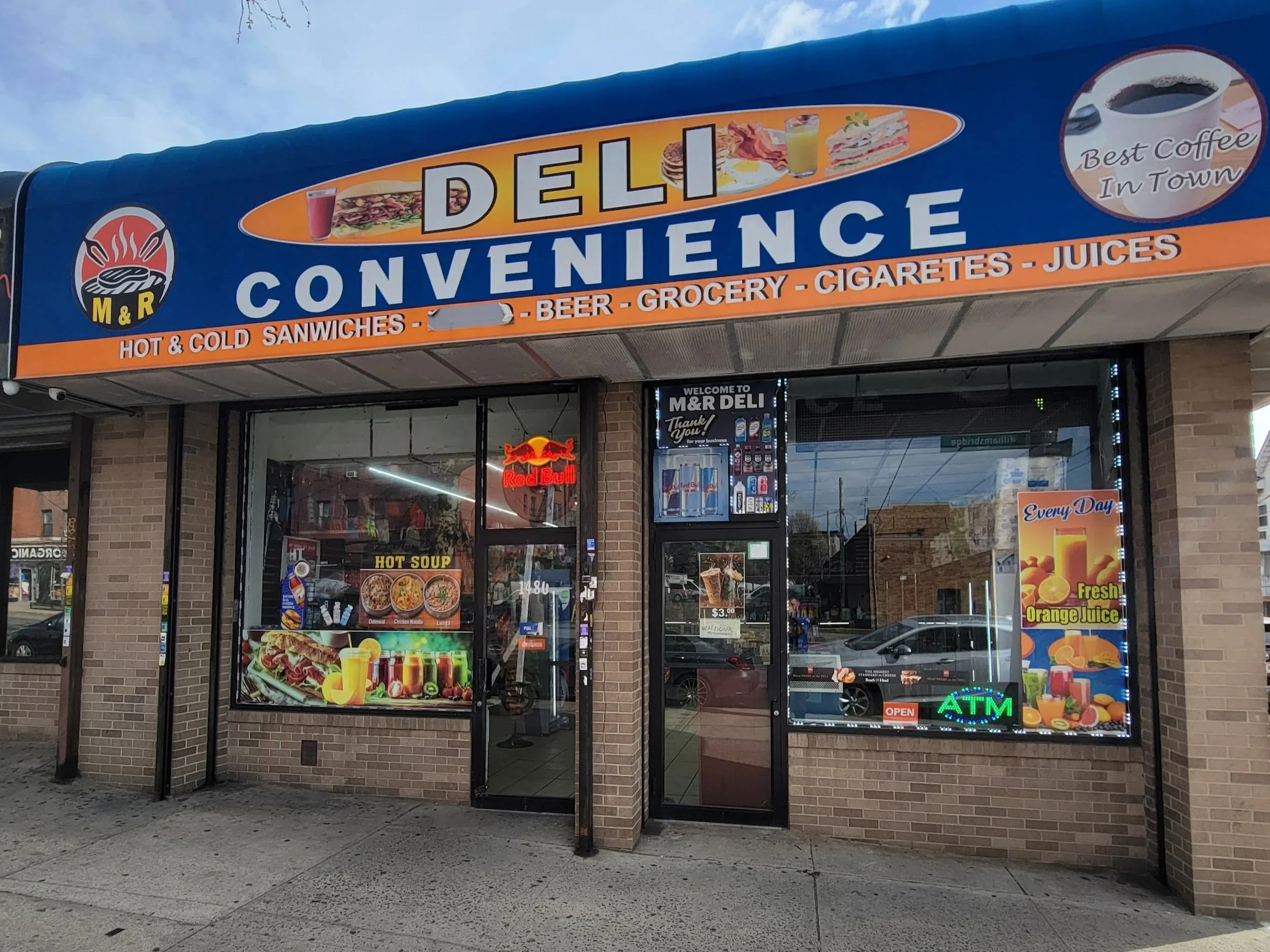 Image of M & R Deli & Grill store front in the Bronx, New York