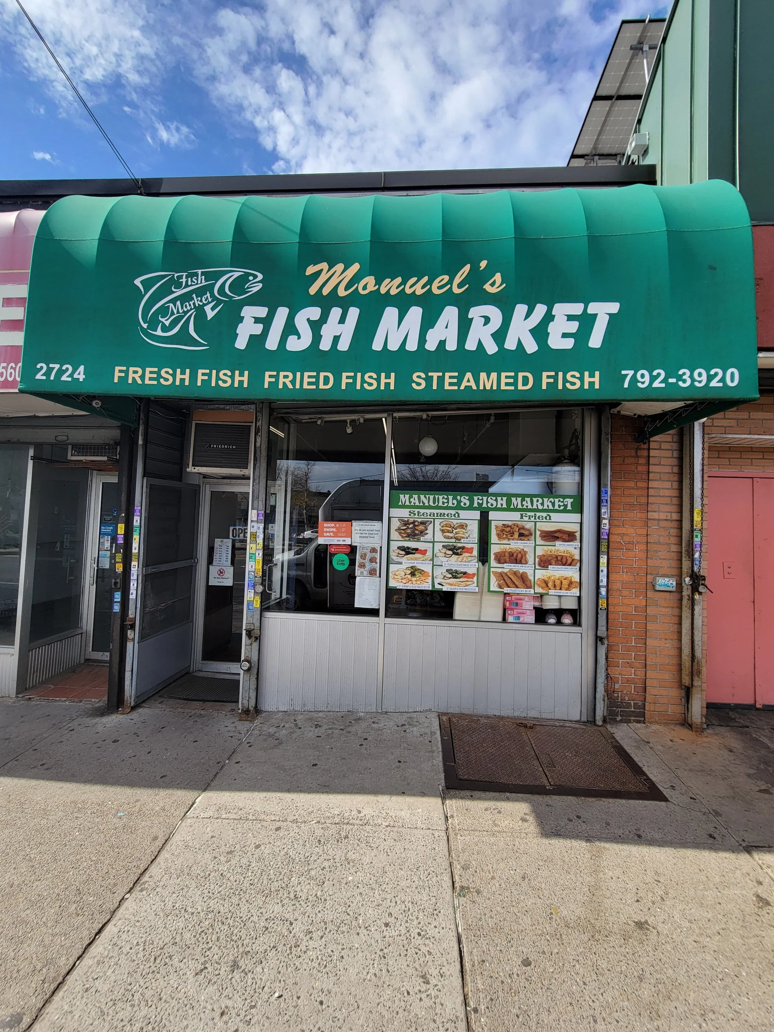Image of Manuel's Fish Market store front in the Bronx, New York