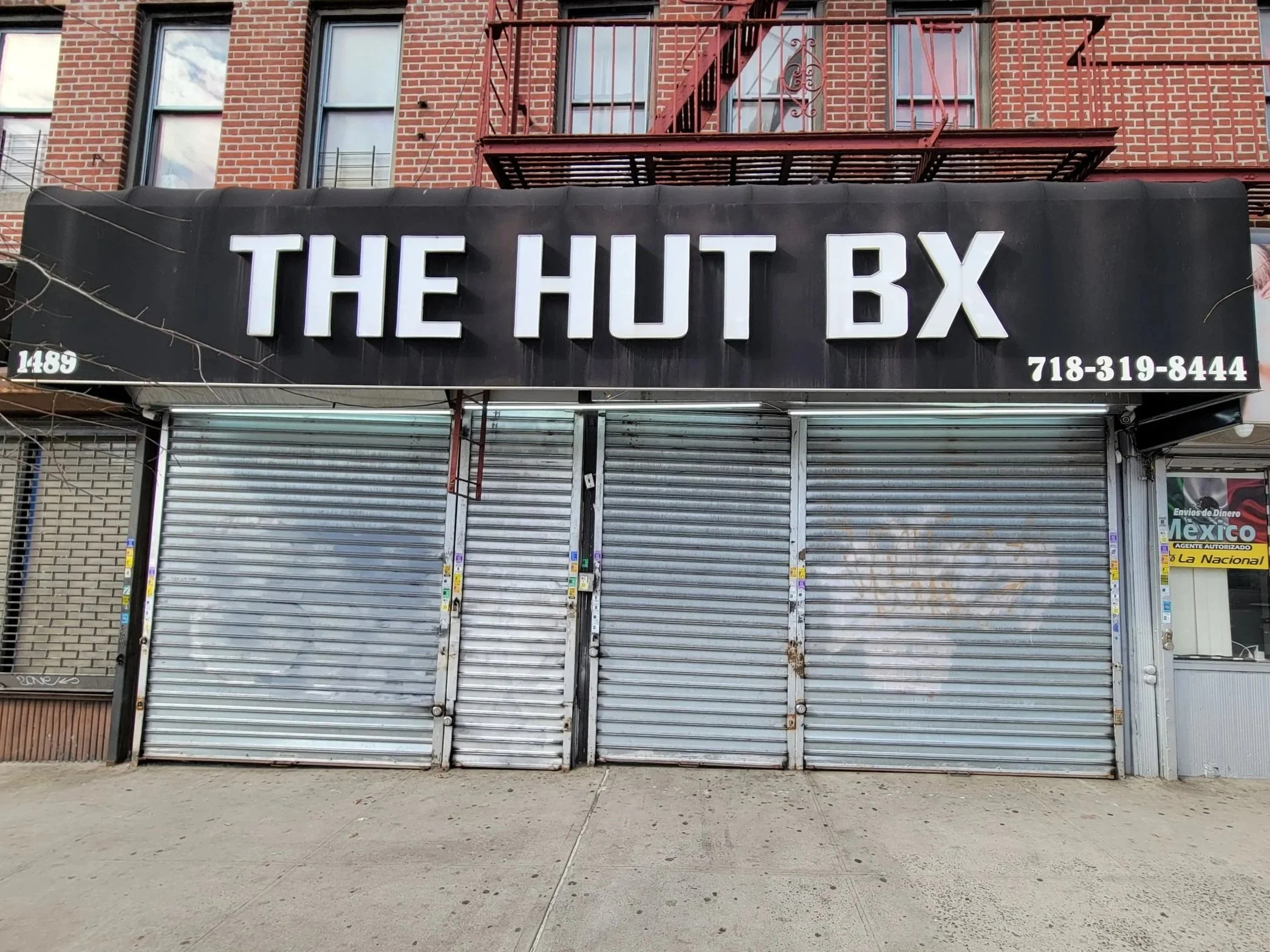 Image of The Hut store front in the Bronx, New York