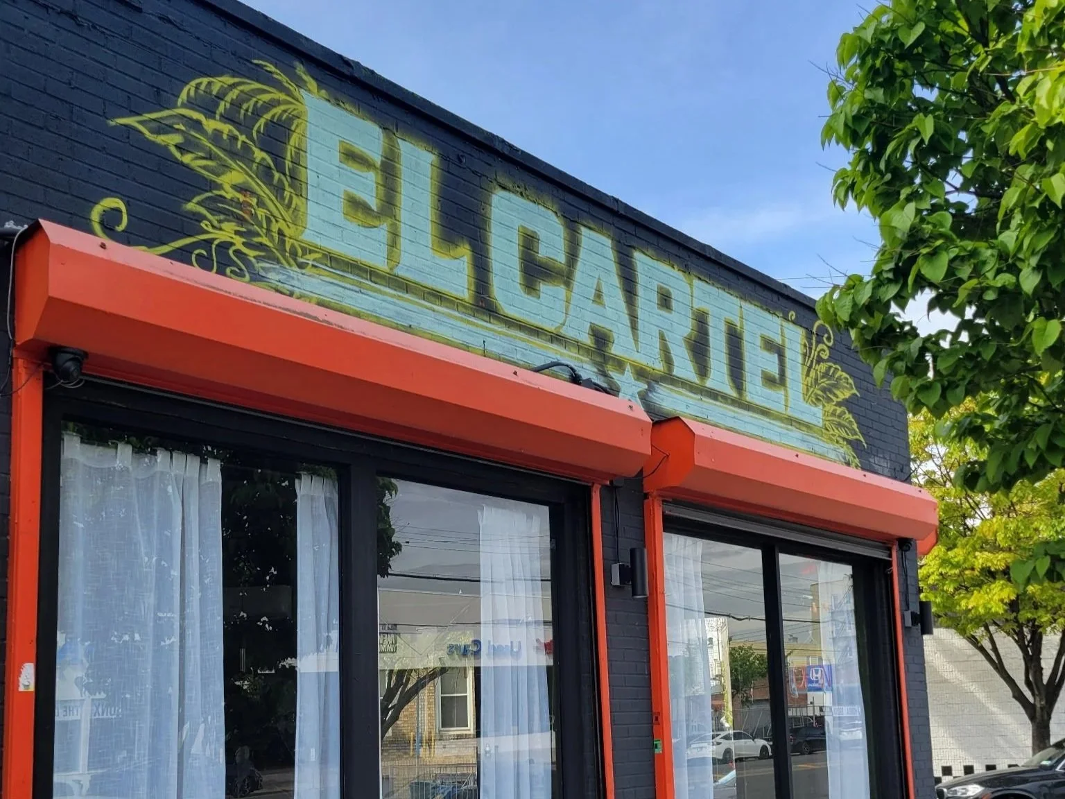 Image of El Cartel  store front in the Bronx, New York