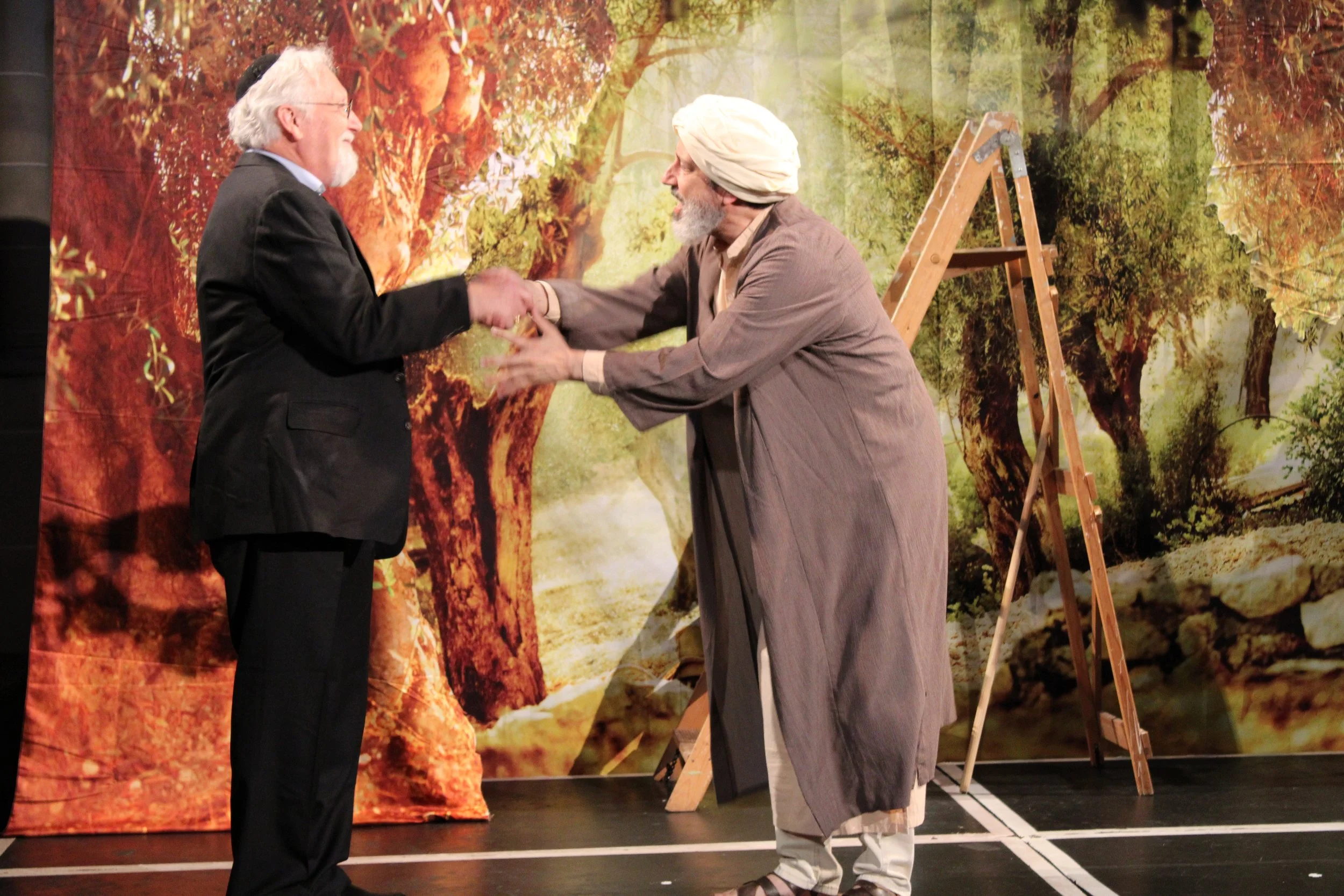 Melke (Mark Peters) and Amir (Mark Quiles)