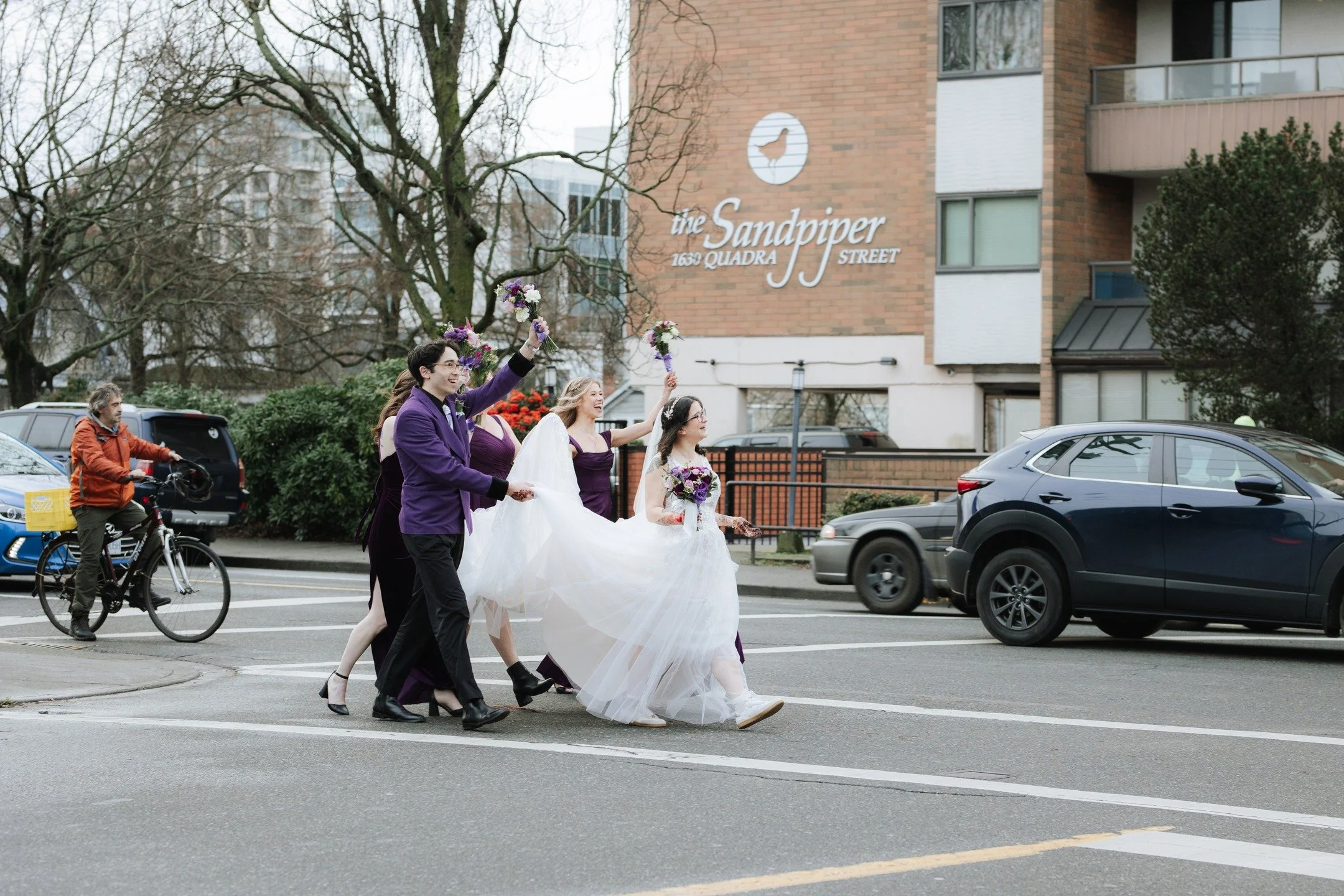 Working my way through editing Genevieve and Harpreet's wedding day this image brought such a big smile to my face. We had so much fun doing these street shots! #bcweddingphotographer #victoriabc #yyjphotography #westcoastwedding #canadianweddingphot