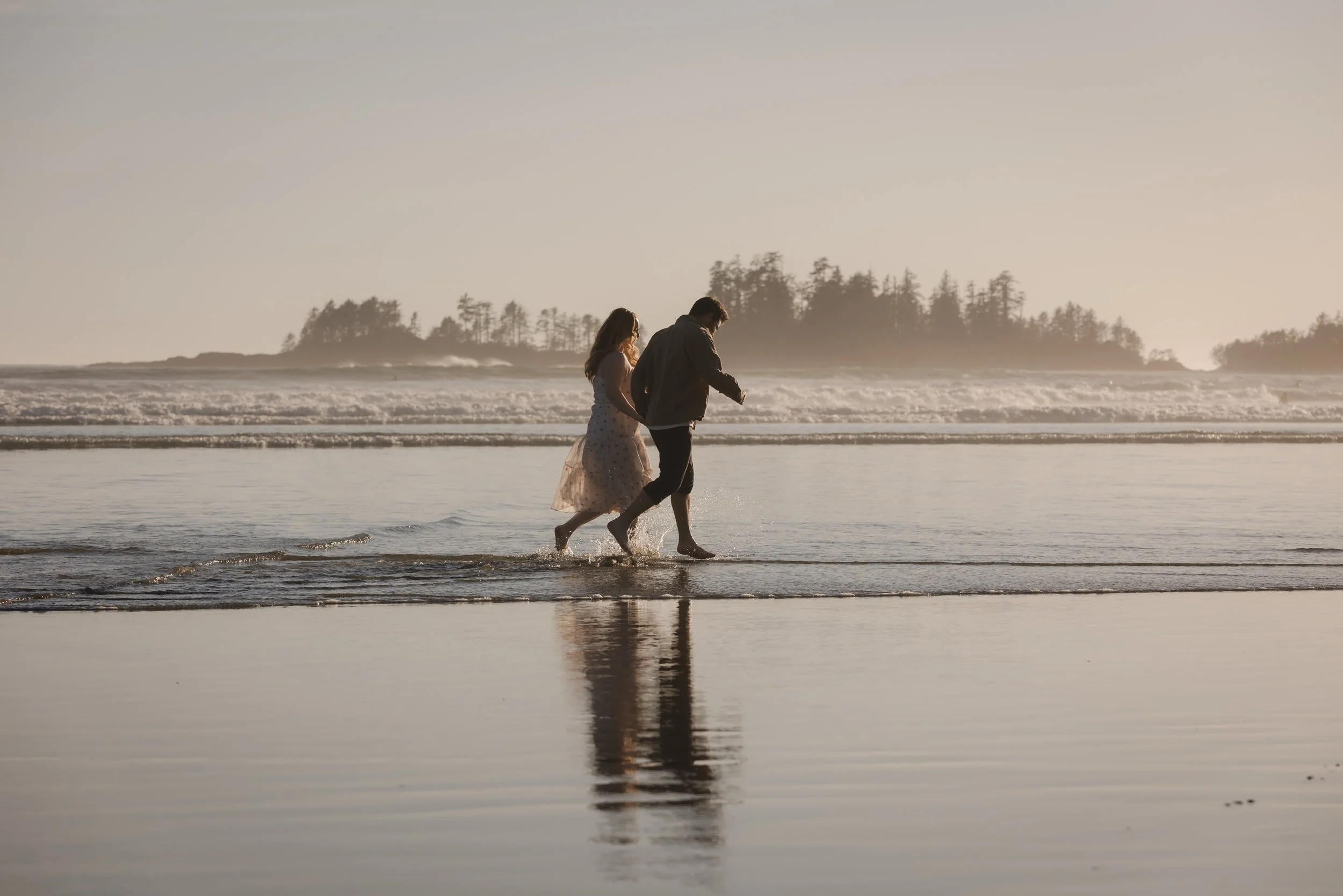 This is your reminder that engagement photos don&rsquo;t have to be formal. Bare feet, wet pants, and a walk along the beach works just fine. #tofinoengagement
#tofino
#vancouverislandweddings
#vancouverislandphotographer
#engagementsession